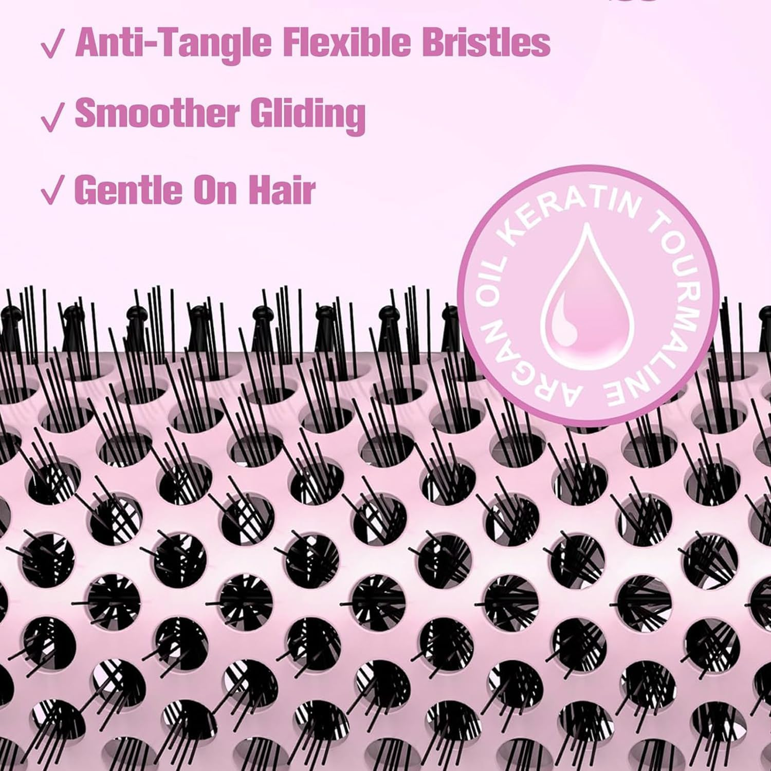 Rosa Haarbürste mit schwarzen Borsten und einem Kreis mit Text für Arganöl, Keratin und Turmalin.