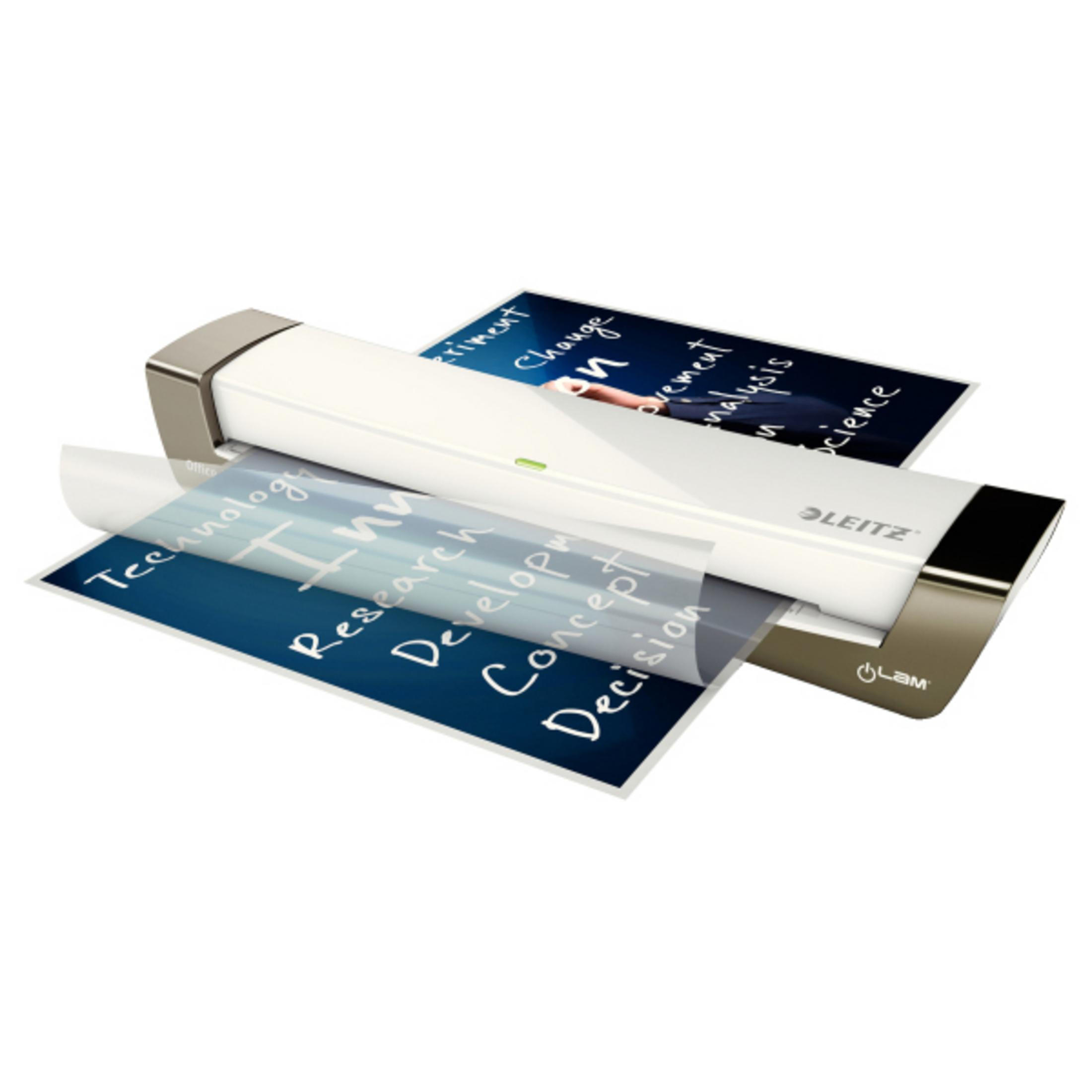 Ein Leitz-Laminator mit Papieren, die Wörter wie Technologie, Forschung, Konzept zeigen.