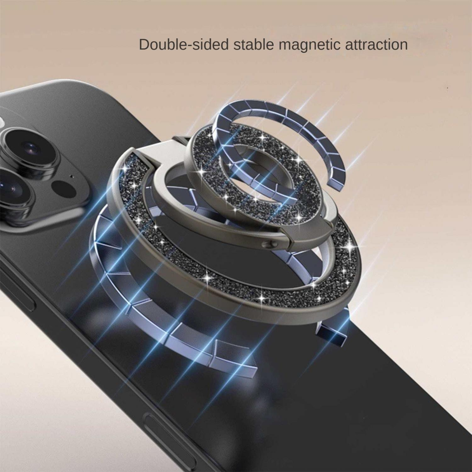 Ein mit Diamanten besetzter Handy-Ringhalter, der an einem schwarzen Handy befestigt ist.
