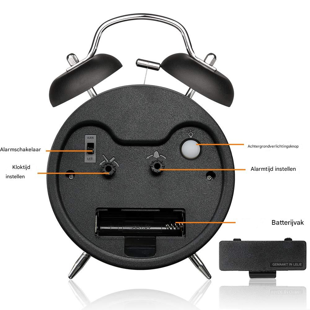 Rückseite eines schwarzen Weckers mit Batteriefach, Alarm- und Zeiteinstellknöpfen.