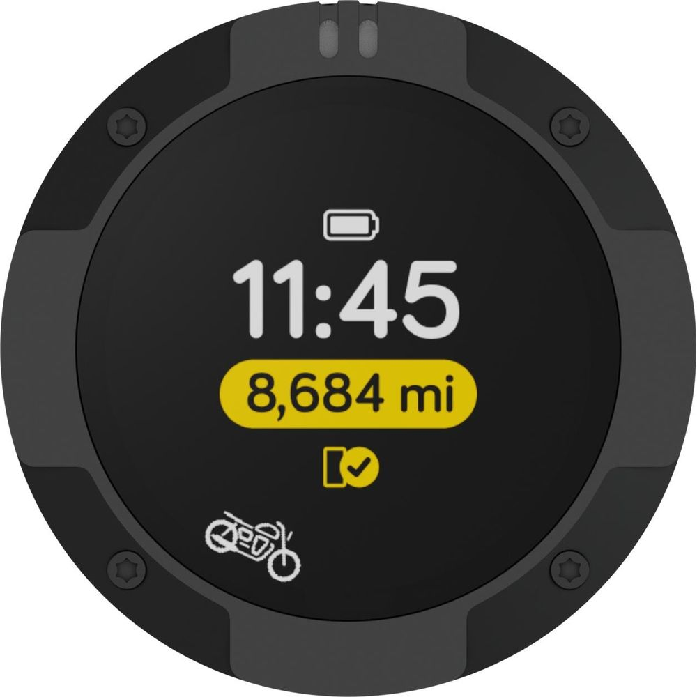 Ein schwarzes Display zeigt 11:45, 8.684 mi, ein Motorrad und ein Häkchen.