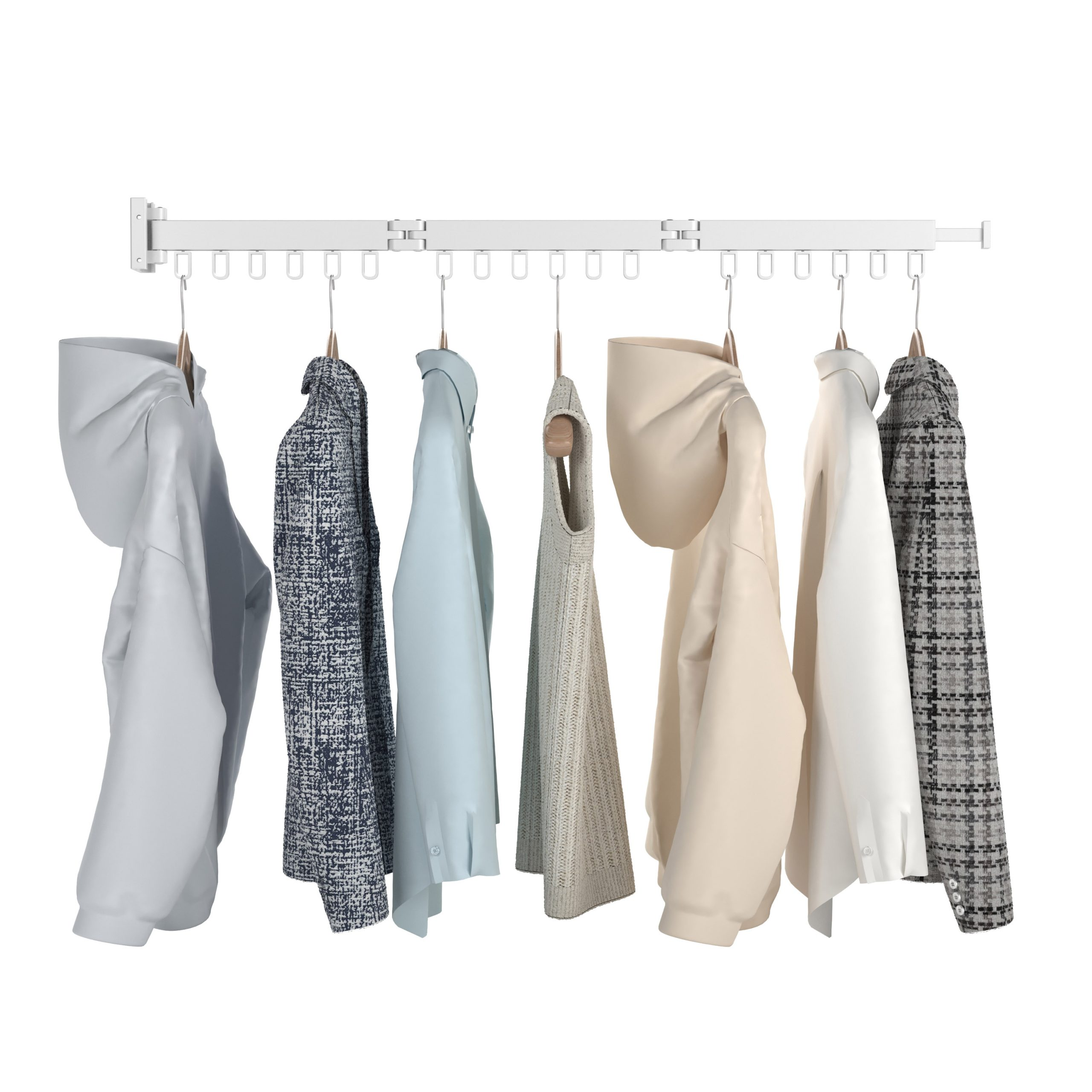 Plusieurs vêtements sont suspendus à une barre blanche.