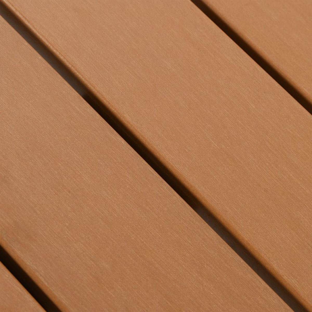 Braune Holzbretter mit Schatten.