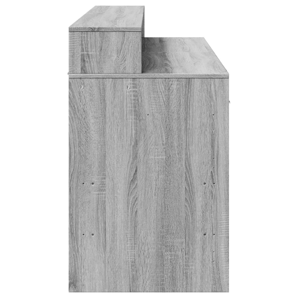 Graues Holzschrank-Detail mit Stufenaufbau.