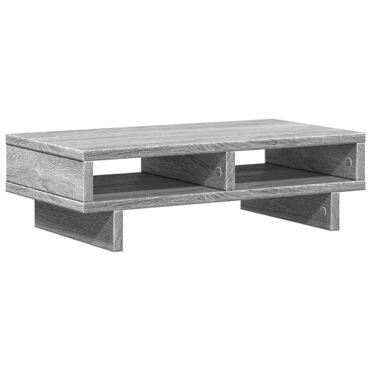 Grauer Holztisch mit zwei offenen Fächern und einer oberen Ablage.