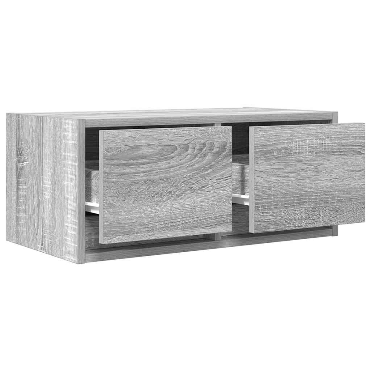 Graues Holz TV-Möbel mit zwei offenen Schubladen.