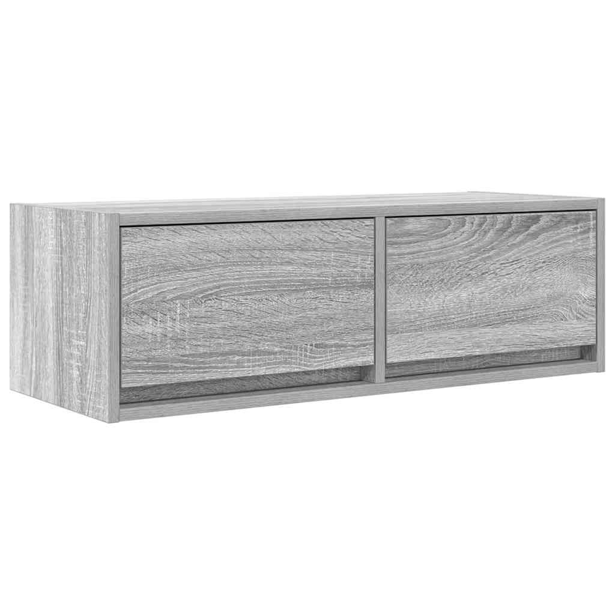 Graues Holzmöbel mit zwei Schubladen.
