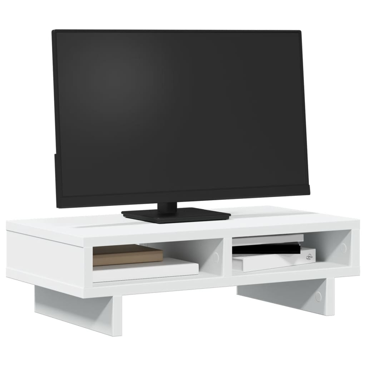 Ein schwarzer Fernseher steht auf einem weißen TV-Möbel mit Büchern.