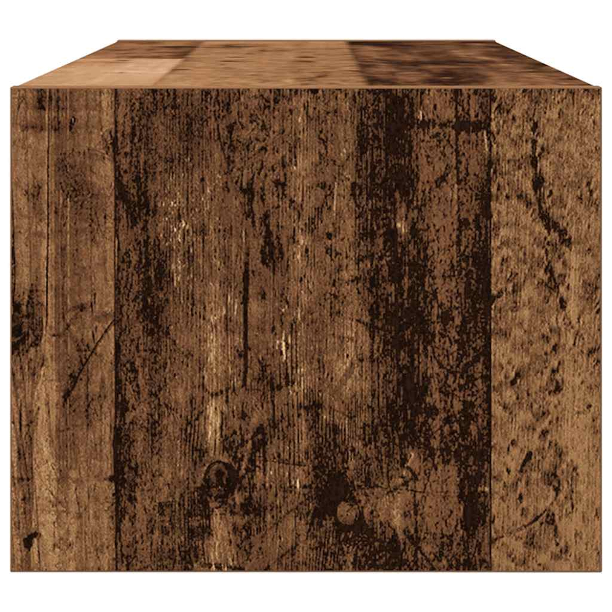 Ein hölzerner Würfel mit grober Textur und sichtbaren Holzmasern.