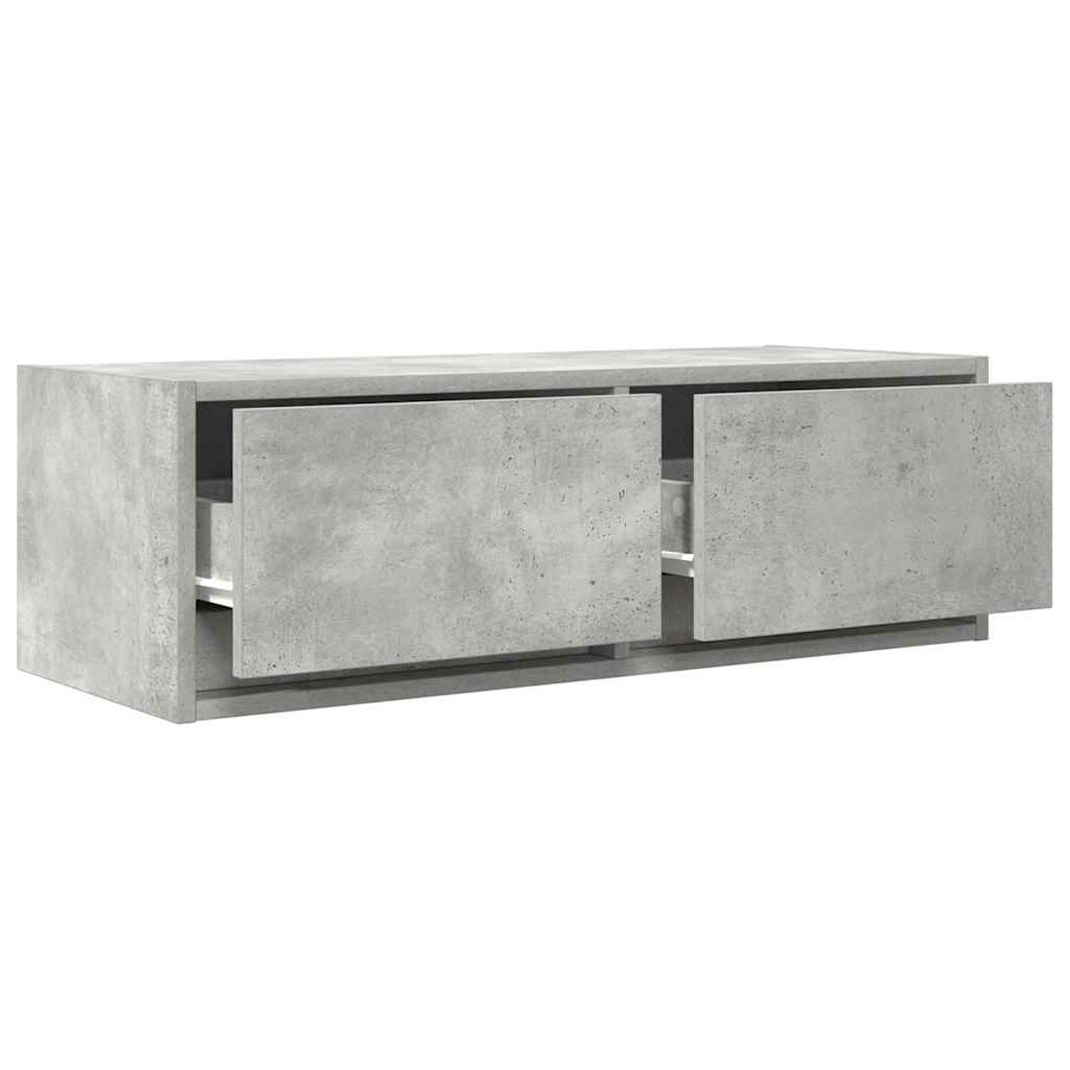 Graues Sideboard mit zwei offenen Schubladen aus Betonoptik.
