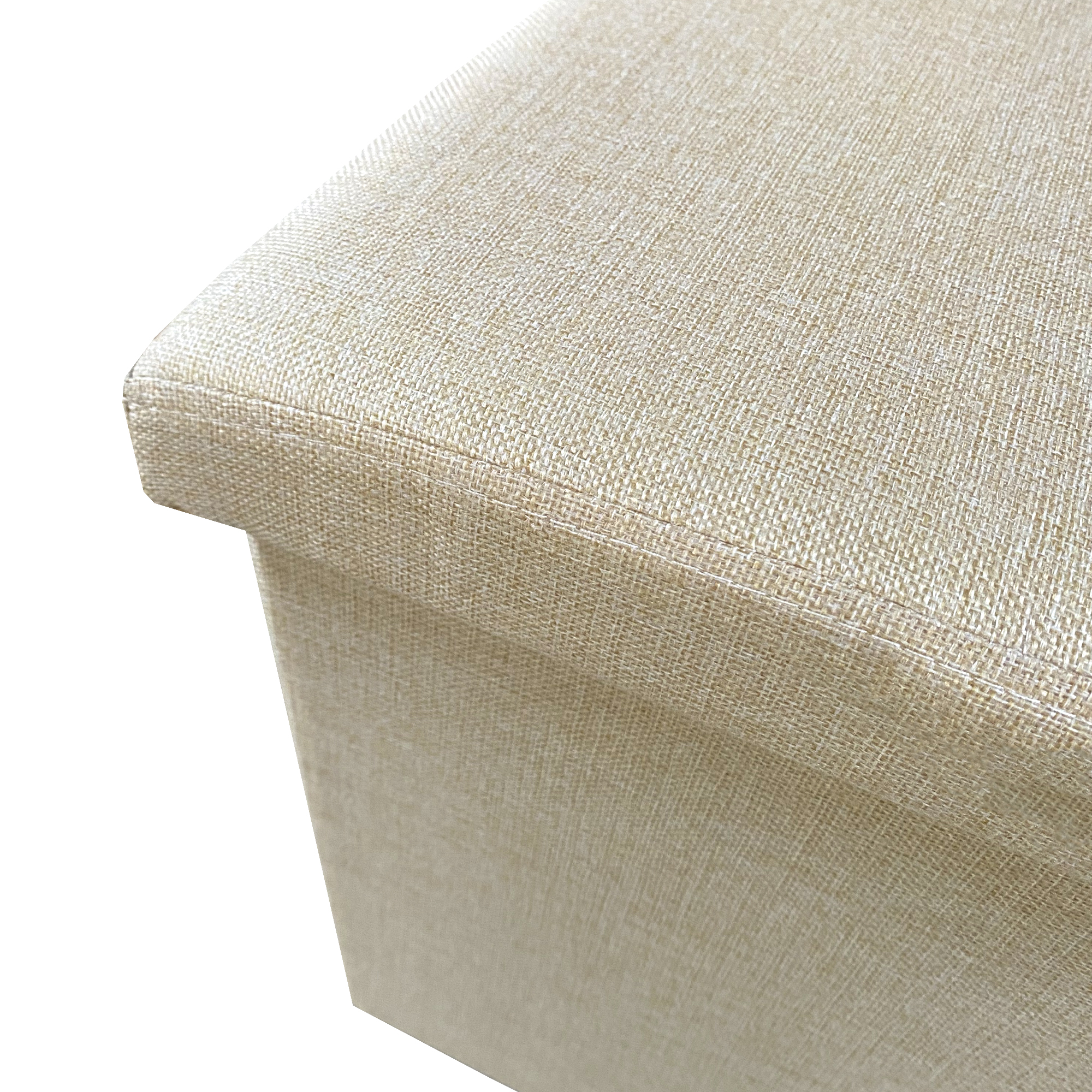 Caja de tela beige, primer plano de la textura y el borde.