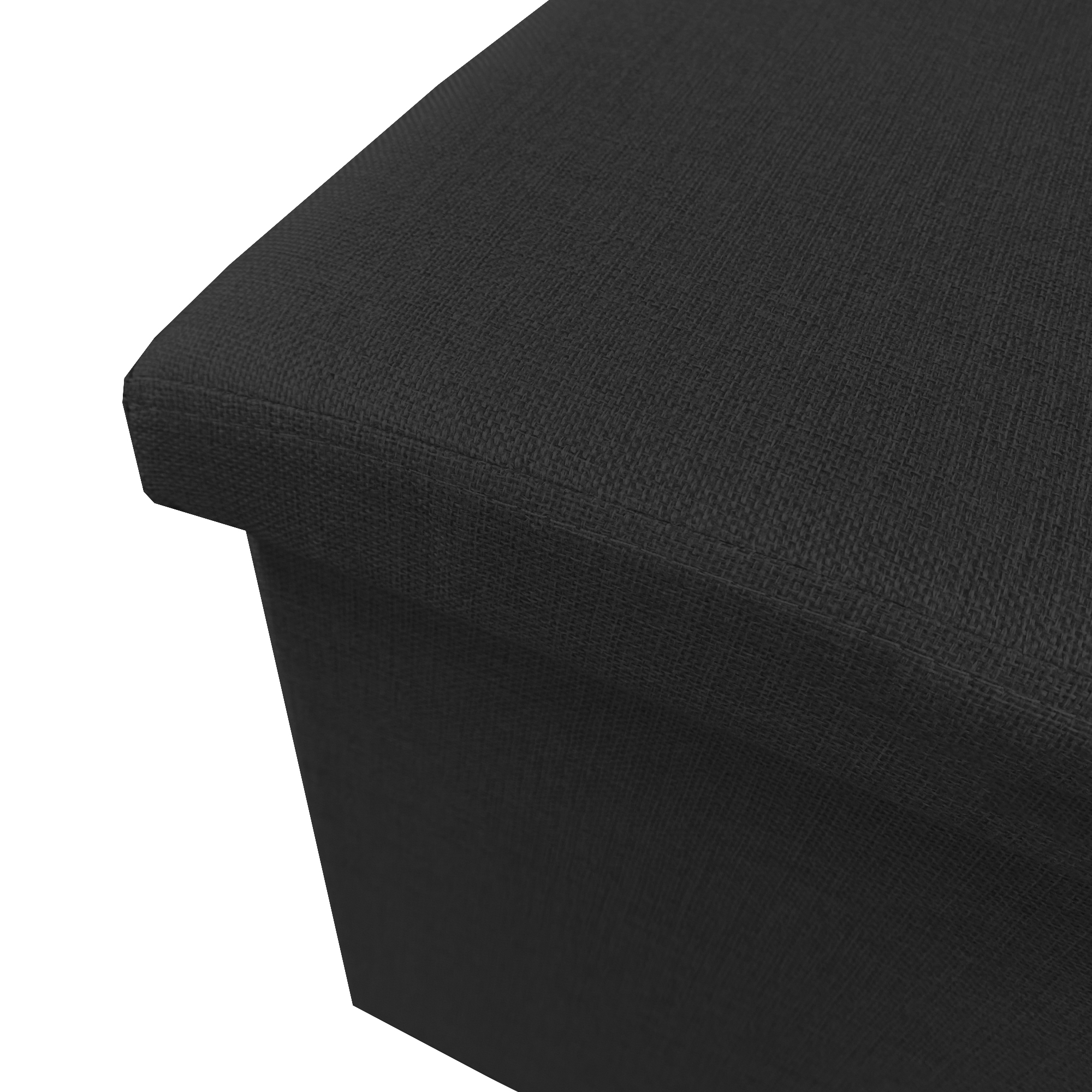 Primer plano de la superficie negra y texturizada de un taburete sobre fondo blanco.