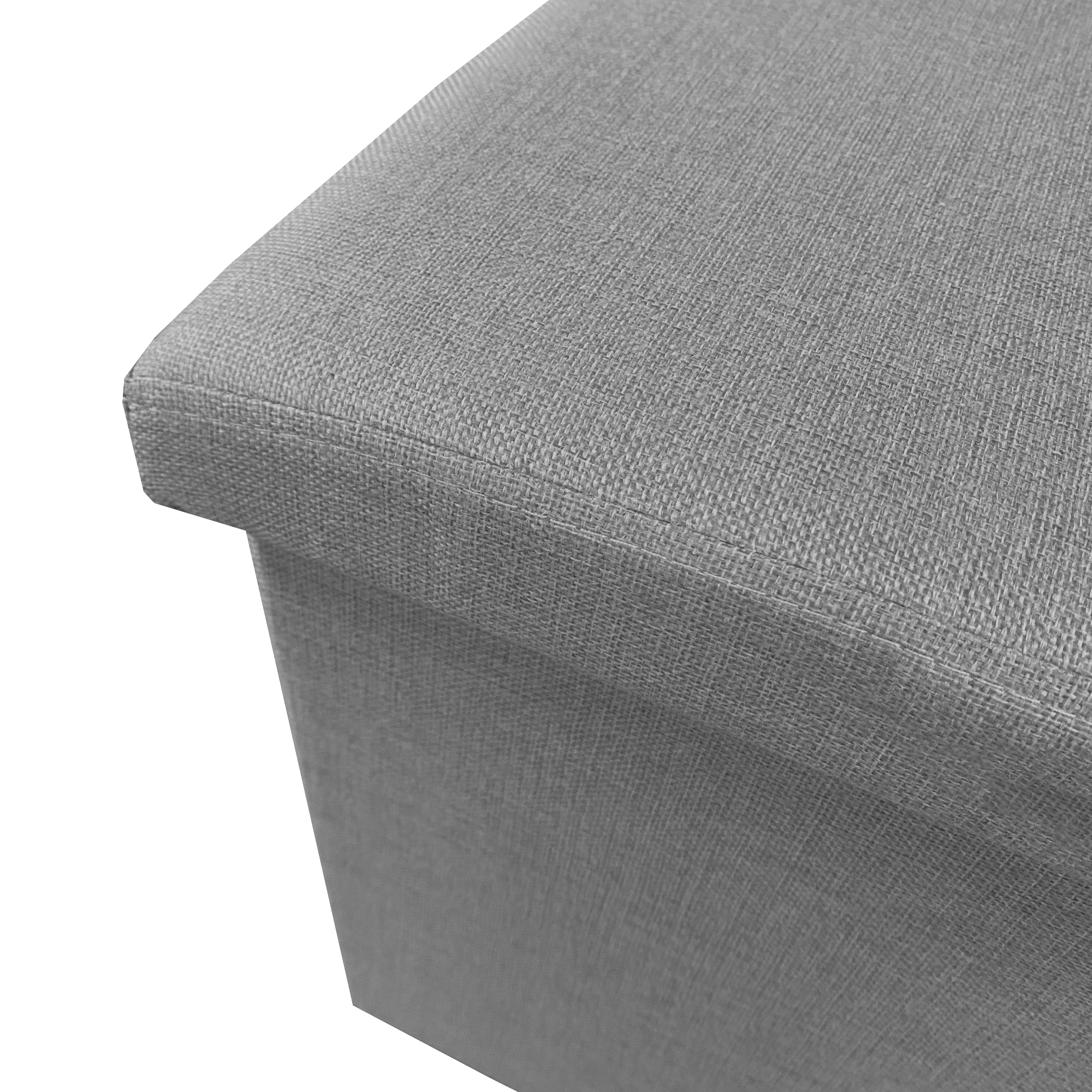 Primer plano de un mueble tapizado en tela gris.