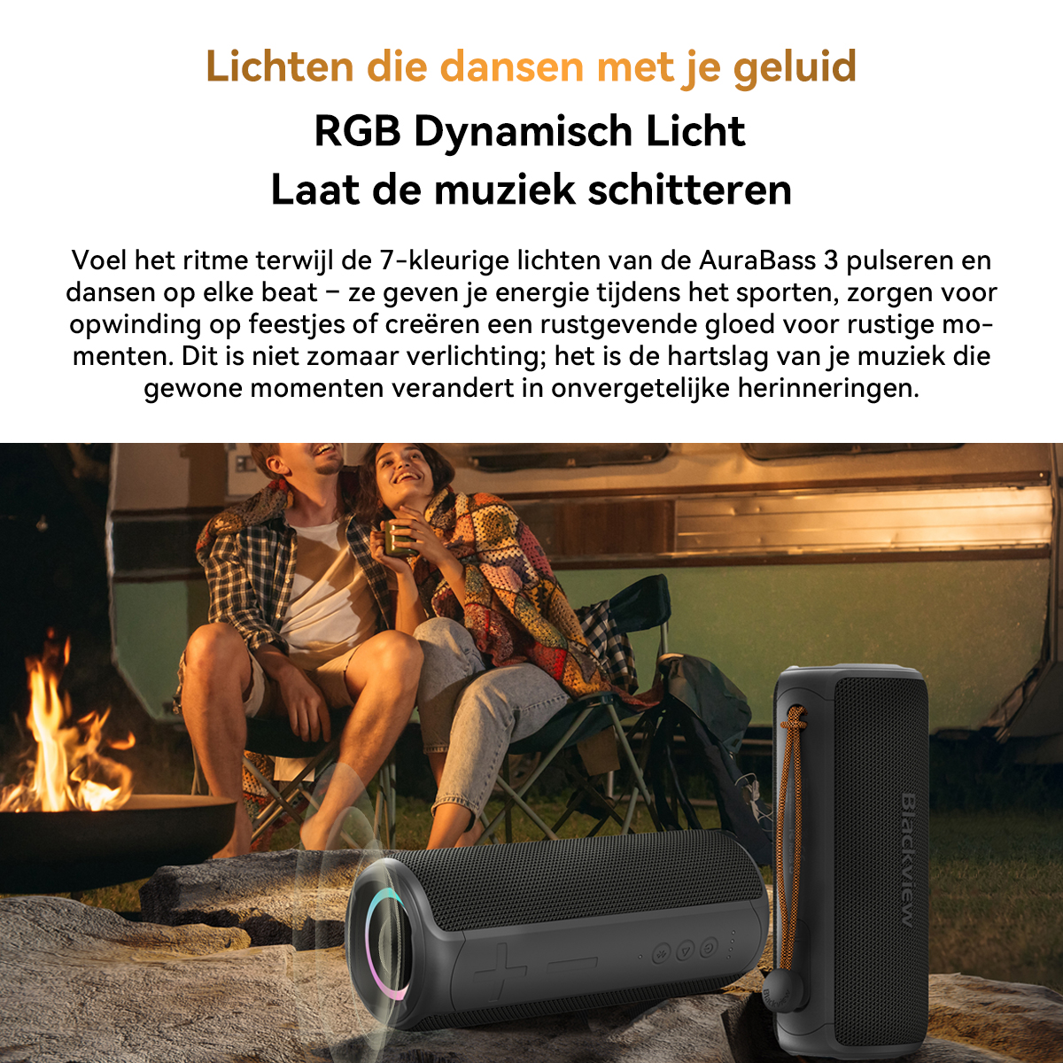 A couple sits by a campfire with speakers. RGB light pulses.