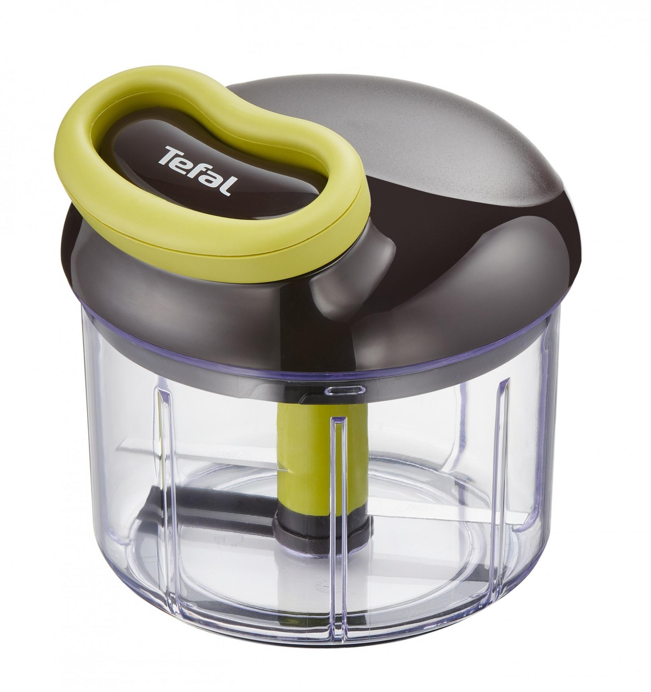 Un tritatutto trasparente con manico verde e logo Tefal su coperchio grigio scuro.