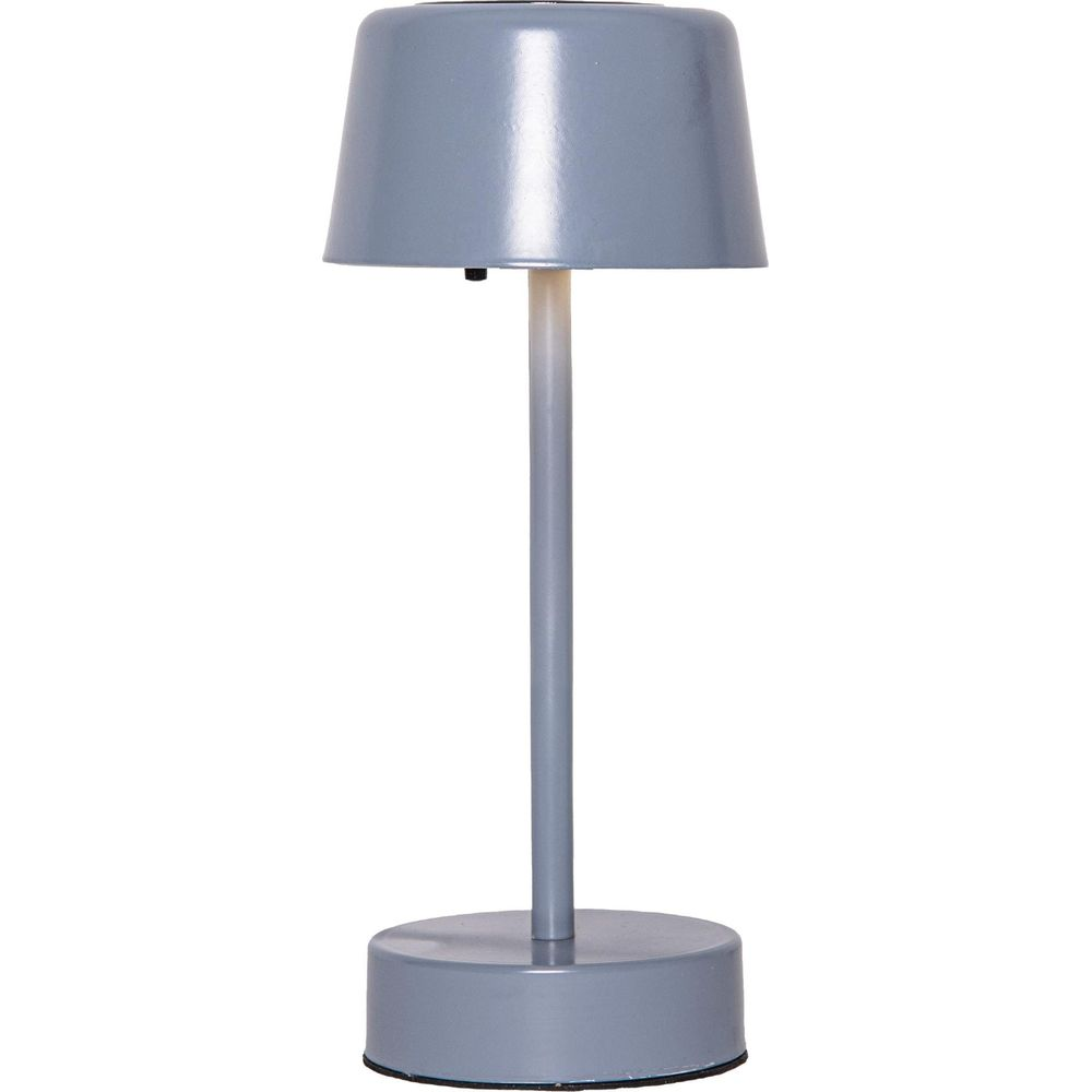 Lampada da tavolo grigia con base rotonda e paralume conico.