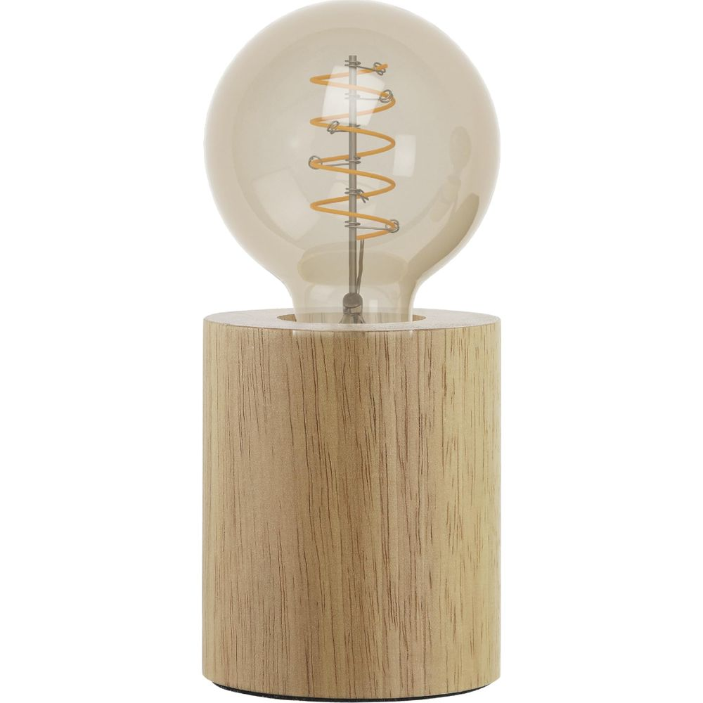 Eine Vintage-Edison-Glühbirne mit Spiralwendel sitzt auf einem Sockel aus hellem Holz.
