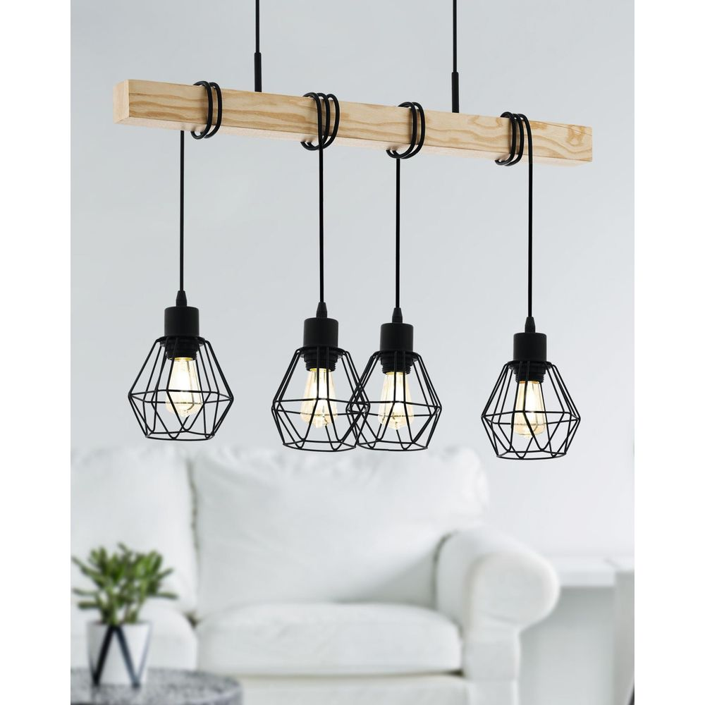 Holzbalken mit vier schwarzen Lampenschirmen im Käfigdesign und Glühbirnen.
