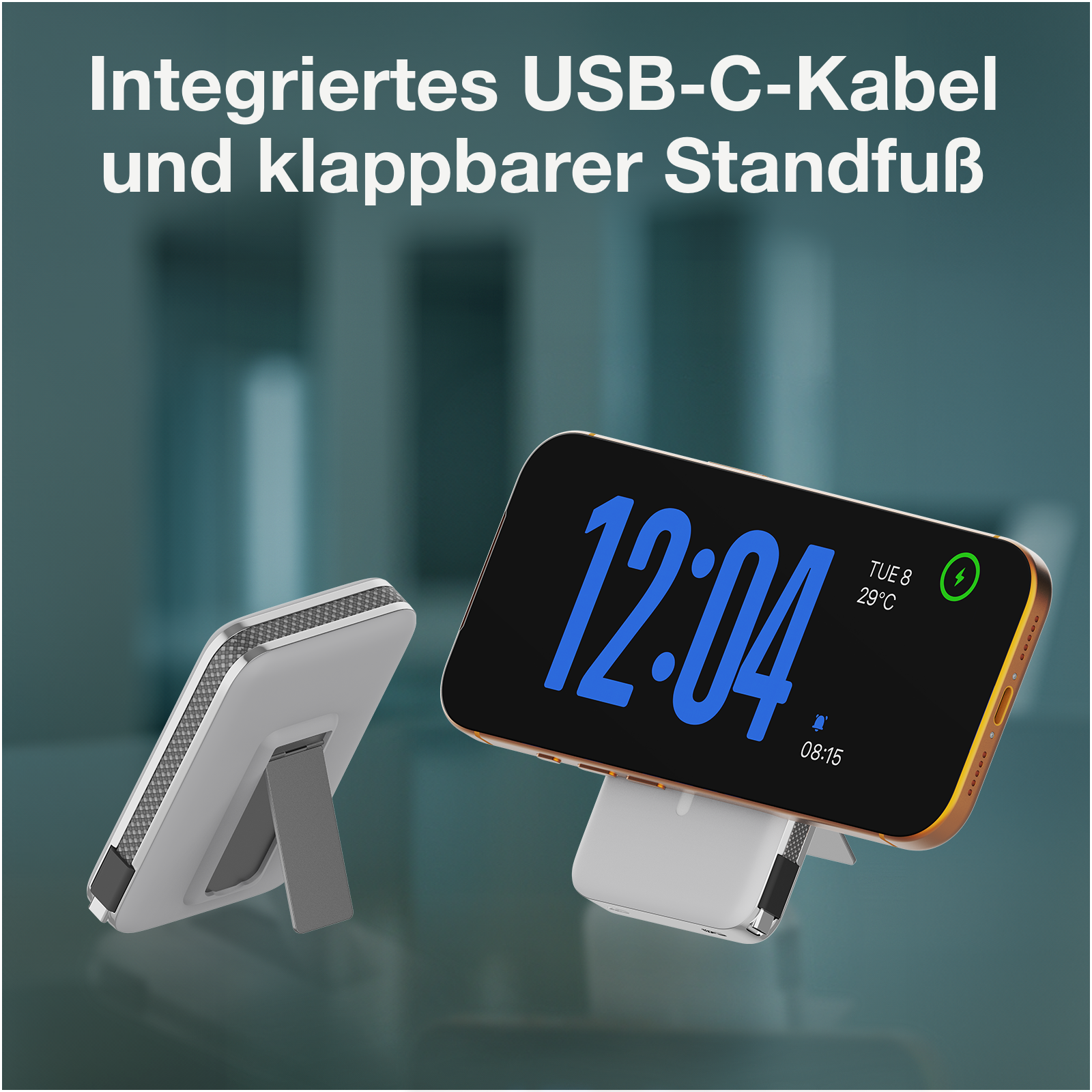 Ein Smartphone mit gelber Hülle steht auf einem Ständer, daneben ein weiteres Gerät.