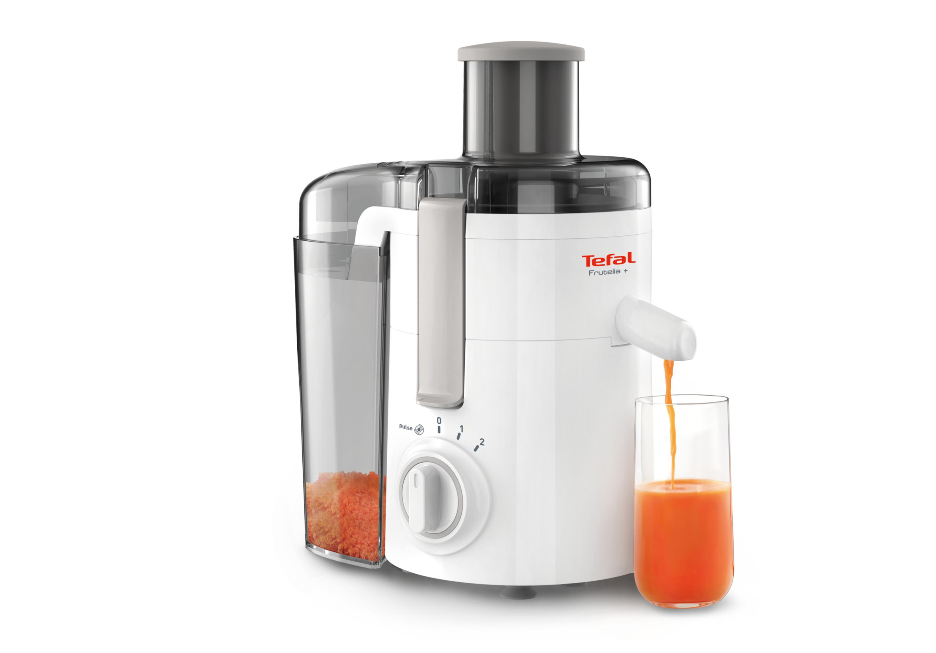 Un'estrattore bianco Tefal spremi liquido arancione in un bicchiere trasparente.