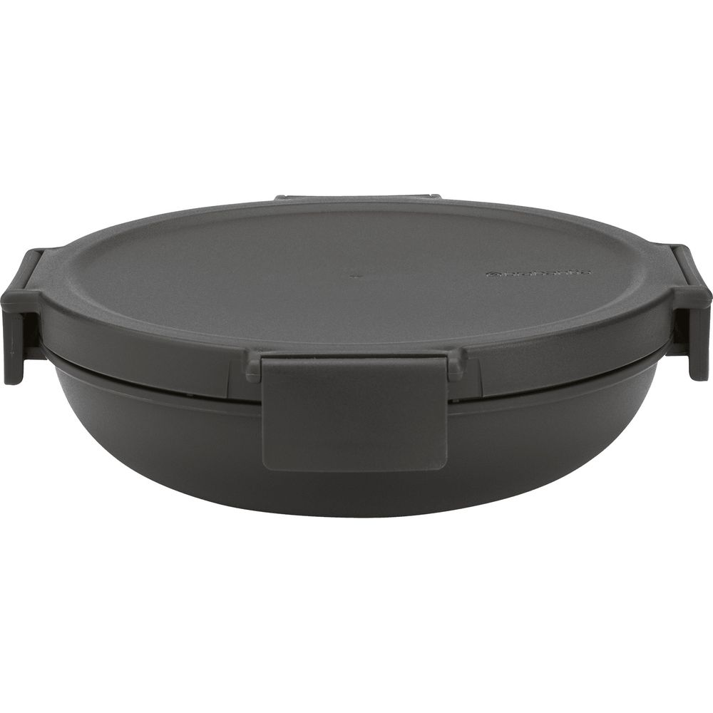 Una lunch box rotonda e scura con clip sui lati.