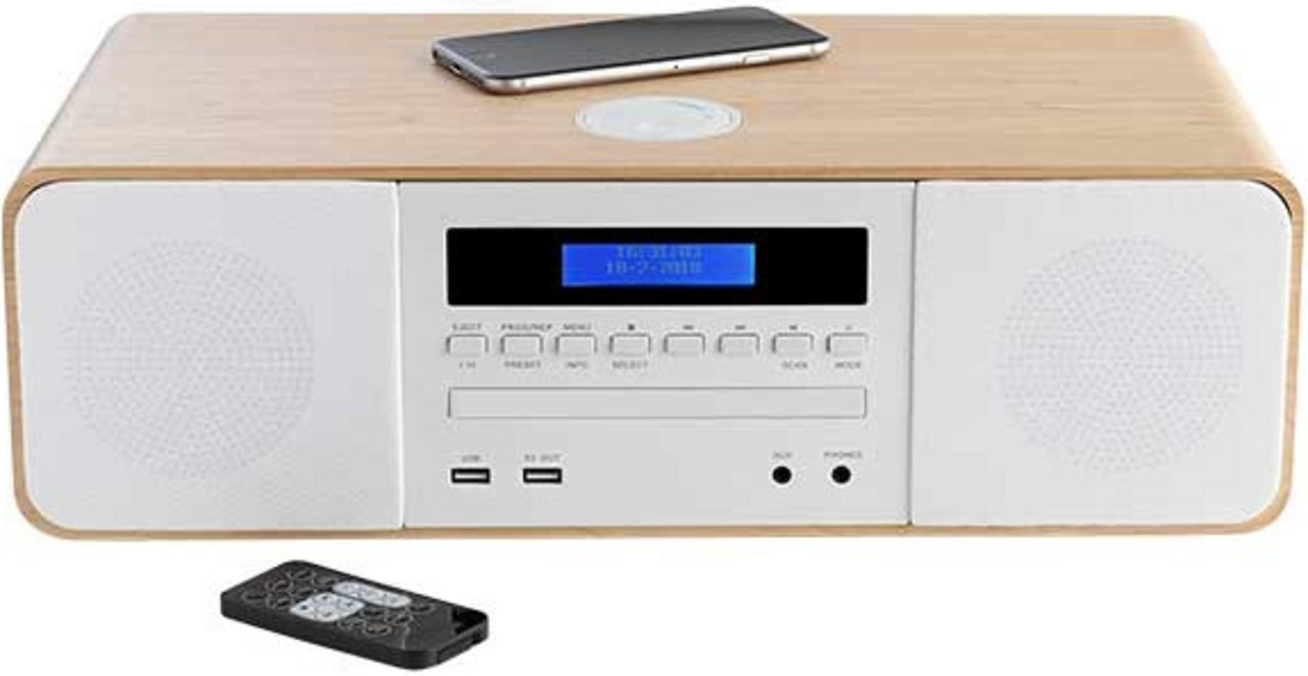 Drewniane i białe radio z telefonem na górze i pilotem z przodu.