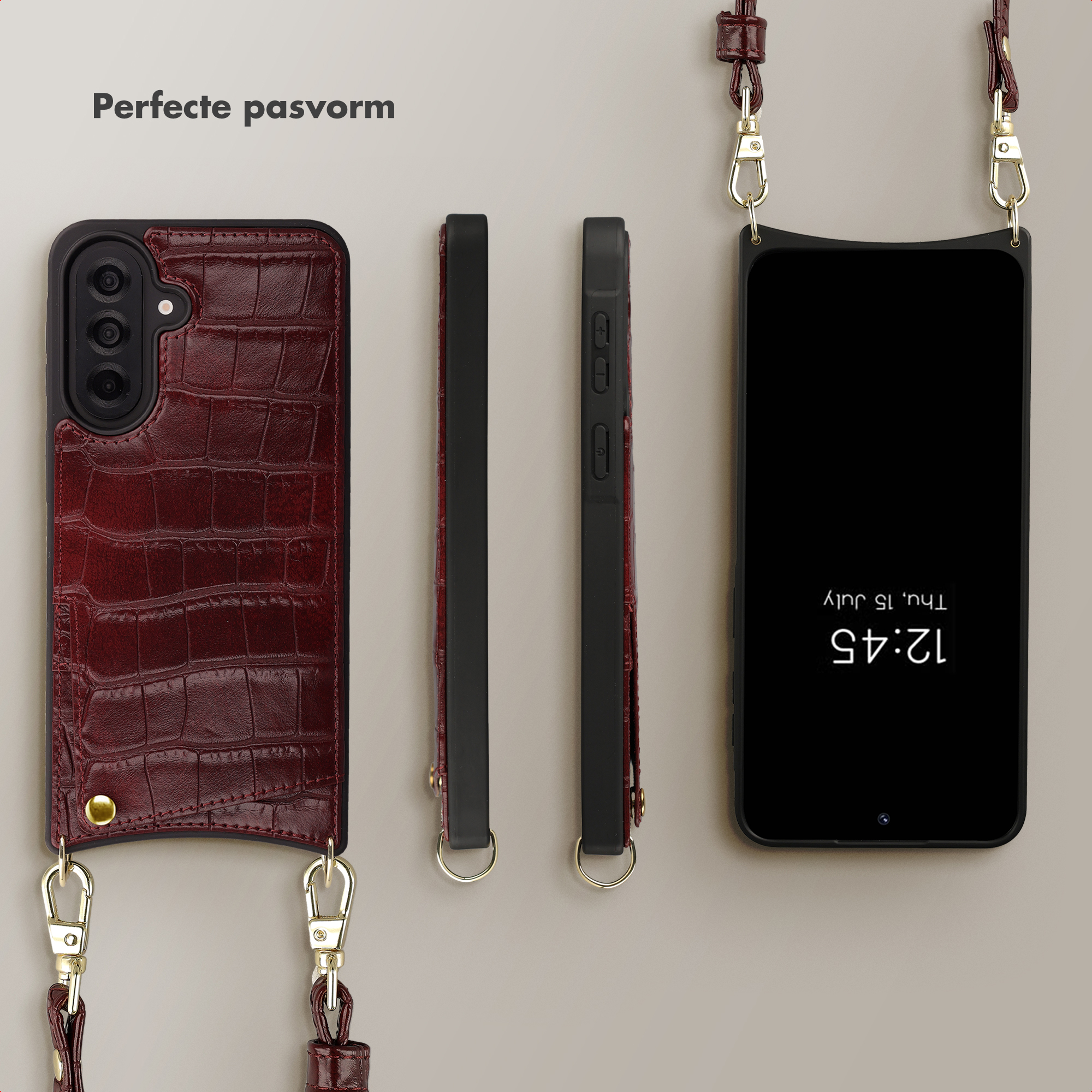Een donkerrode krokodillenleren telefoonhoes met riem en een zwarte smartphone.