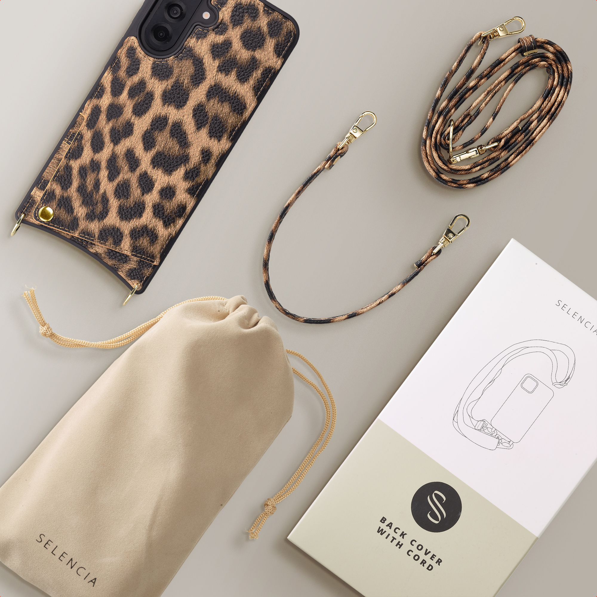Coque de téléphone léopard avec cordon, pochette et emballage.