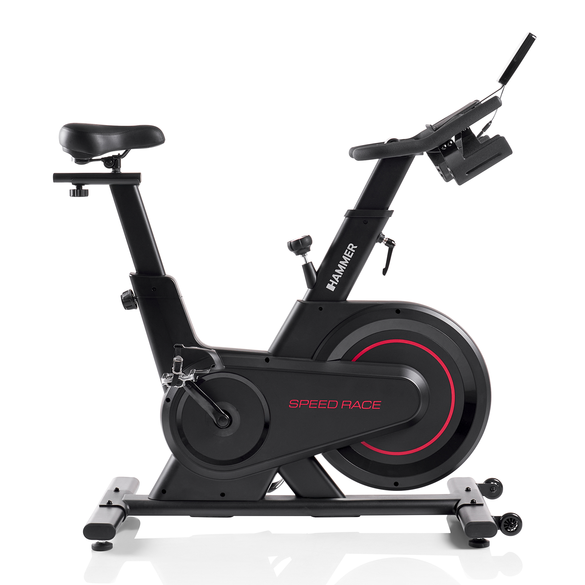 Czarny rower stacjonarny z czerwonym napisem "SPEED RACE" i czerwonym pierścieniem na kole zamachowym.