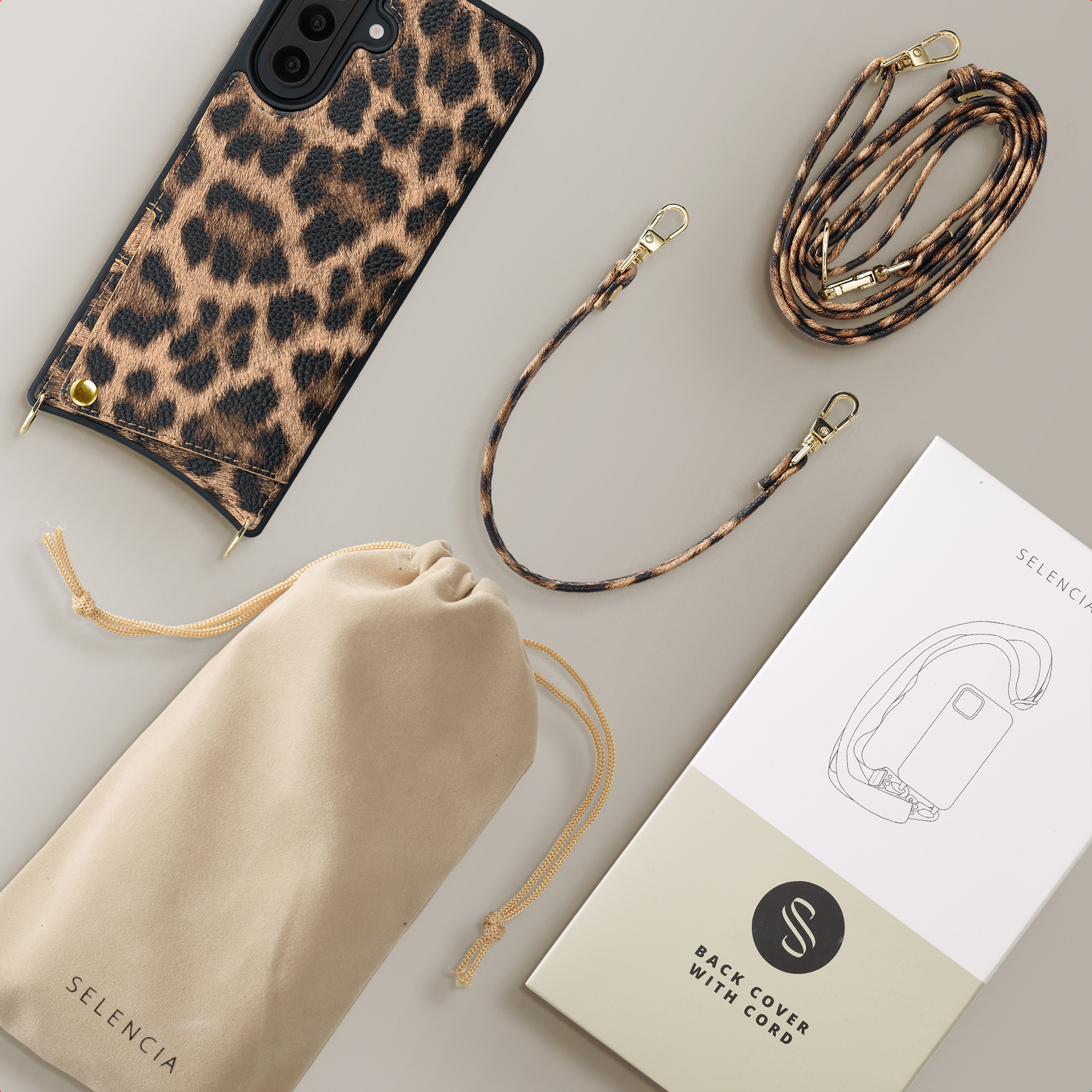 Coque de téléphone léopard avec cordon, pochette et emballage.