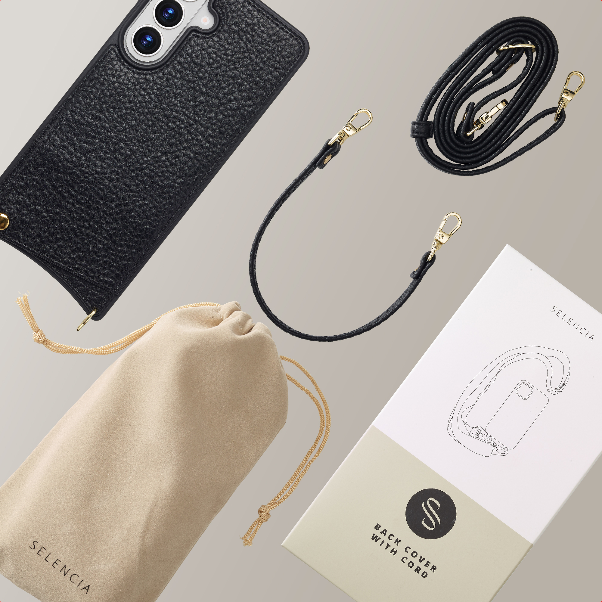 Étui en cuir noir, cordon, pochette et boîte avec schéma.