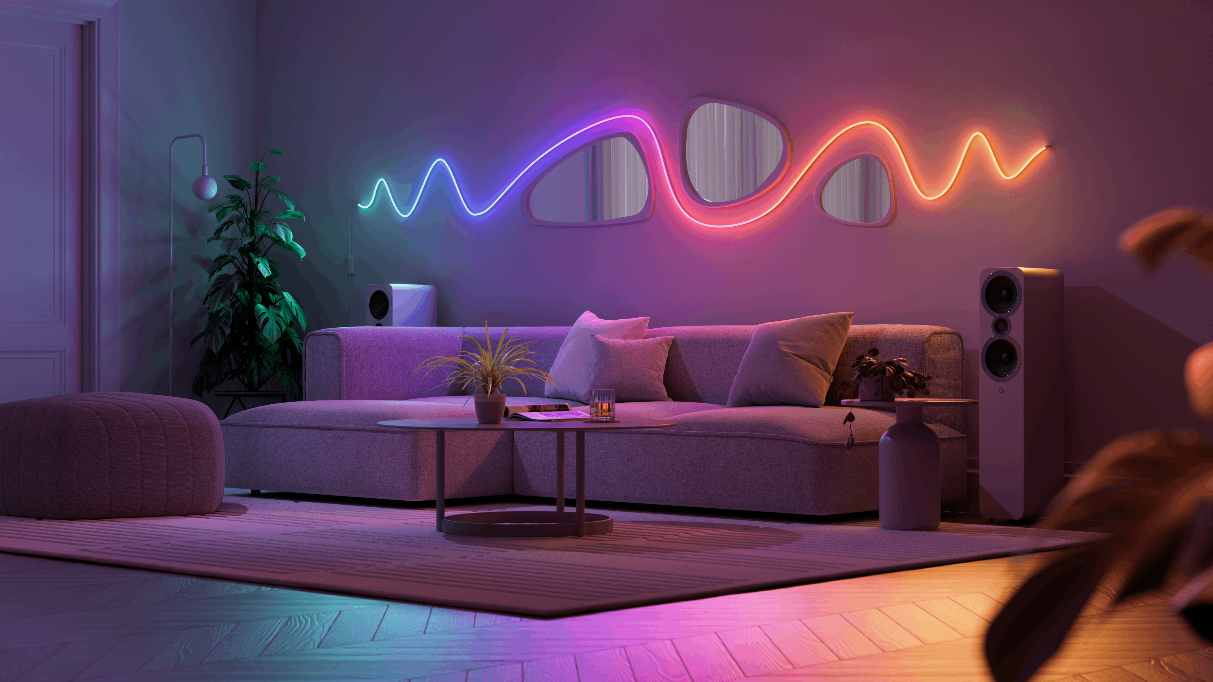 Modernes Wohnzimmer mit violetter und oranger Neon-Wellenlicht, grauem Sofa, Pflanzen und Lautsprechern.