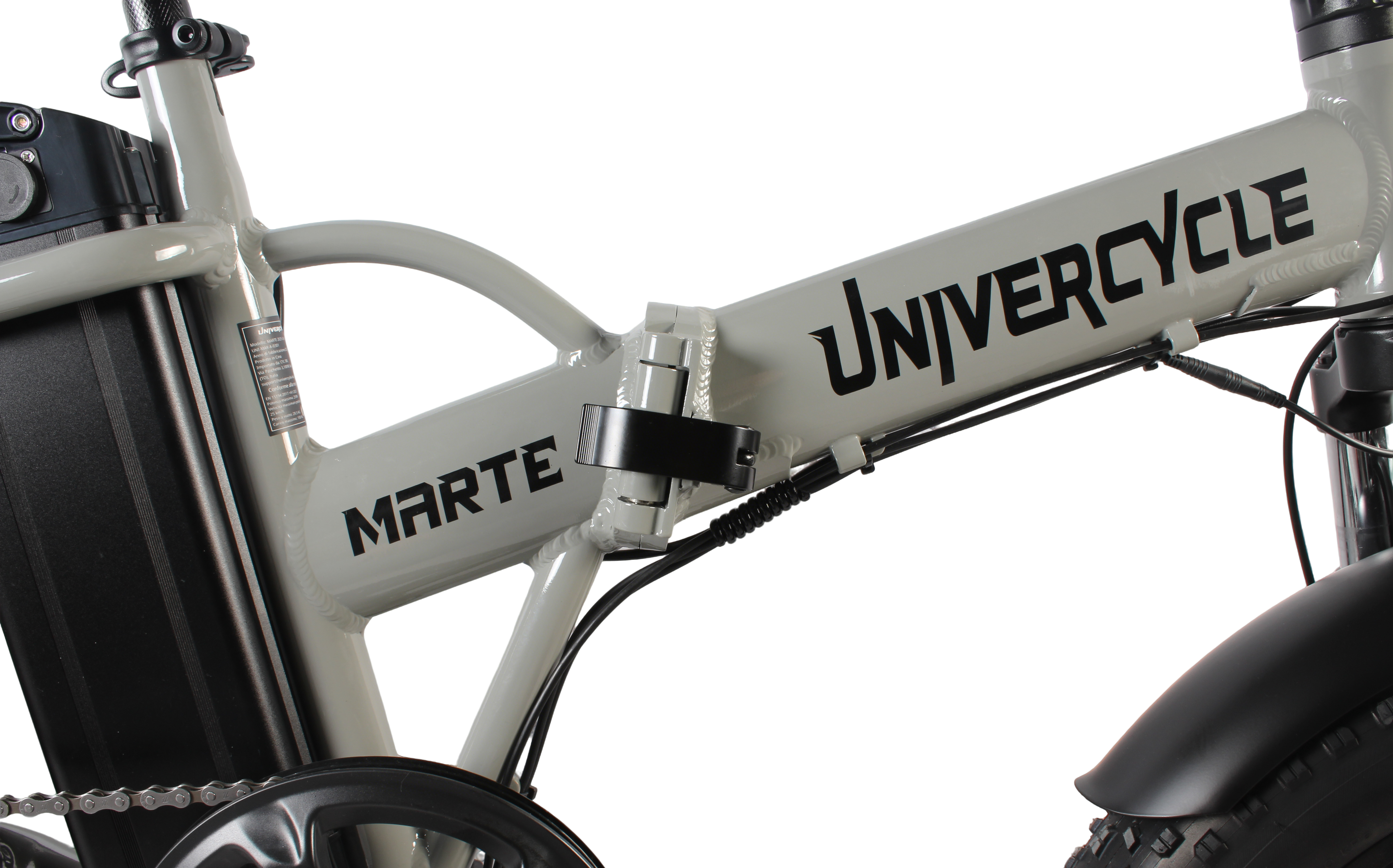 Graues Fahrrad mit schwarzer Schrift UNIVER und MARTE. Akkupack und Kette sichtbar.