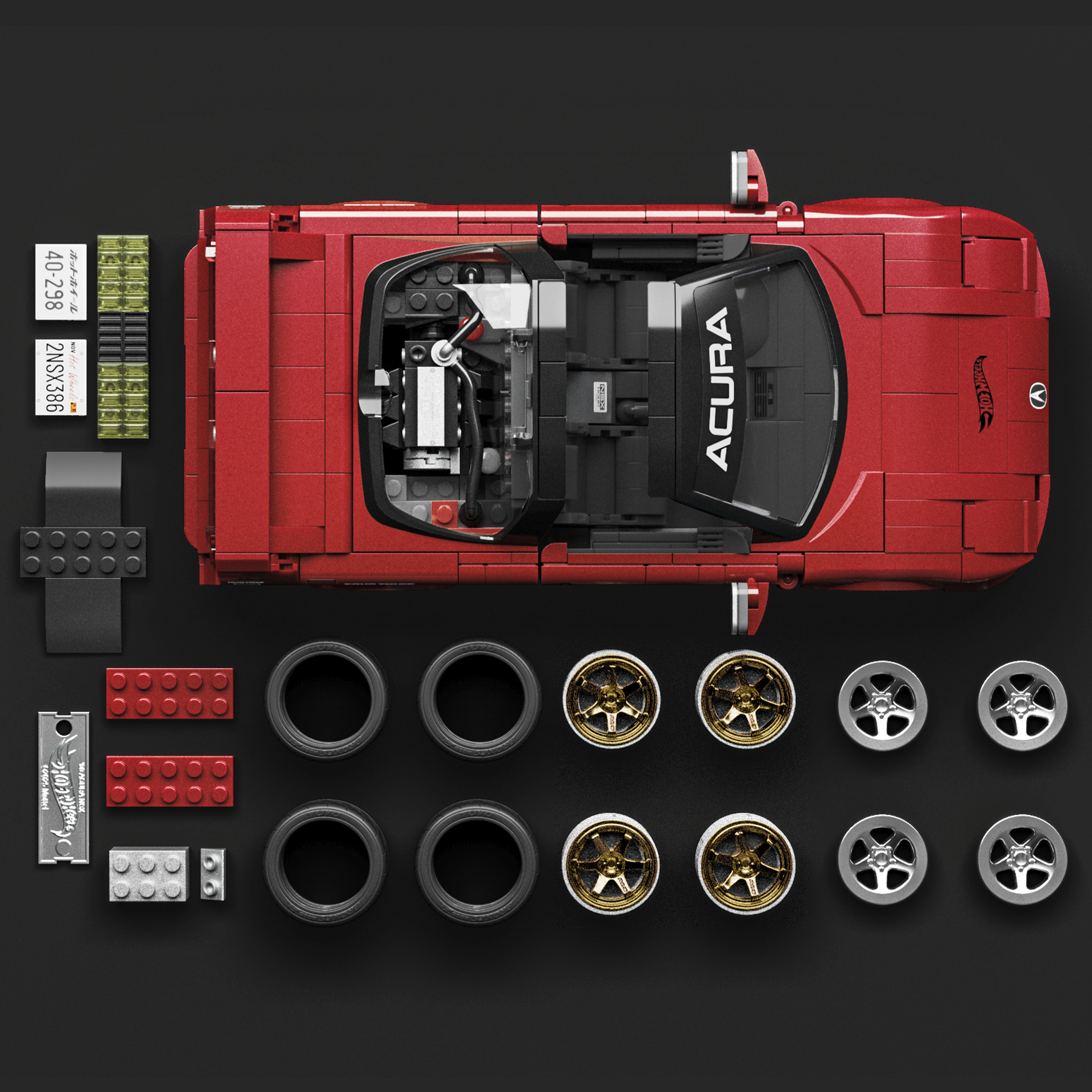 Acura NSX Lego rossa con motore, ruote, pneumatici e targhe.