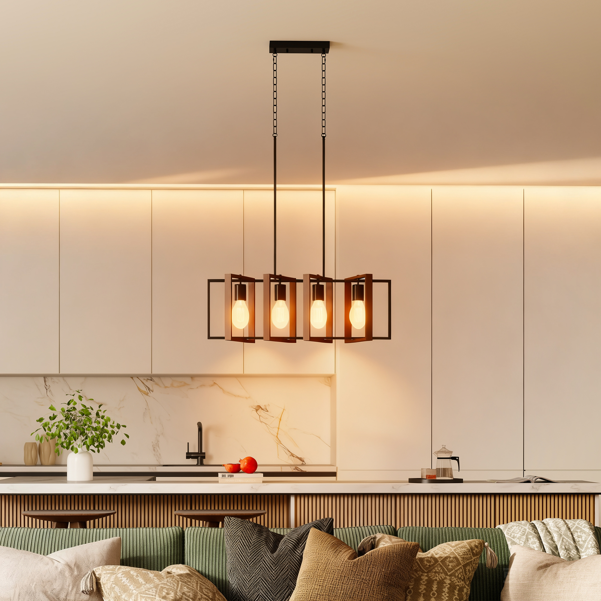 Un lampadario moderno sopra un'isola della cucina con alzatina in marmo.