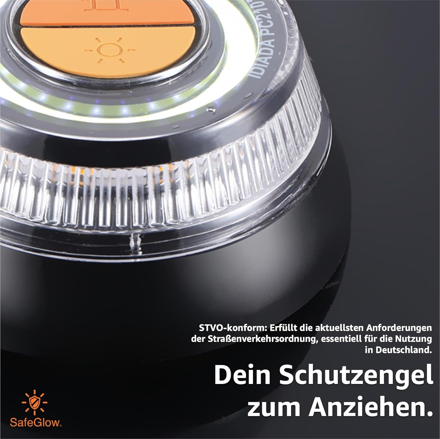 Nahaufnahme einer orangefarbenen und weißen Warnleuchte mit Text.