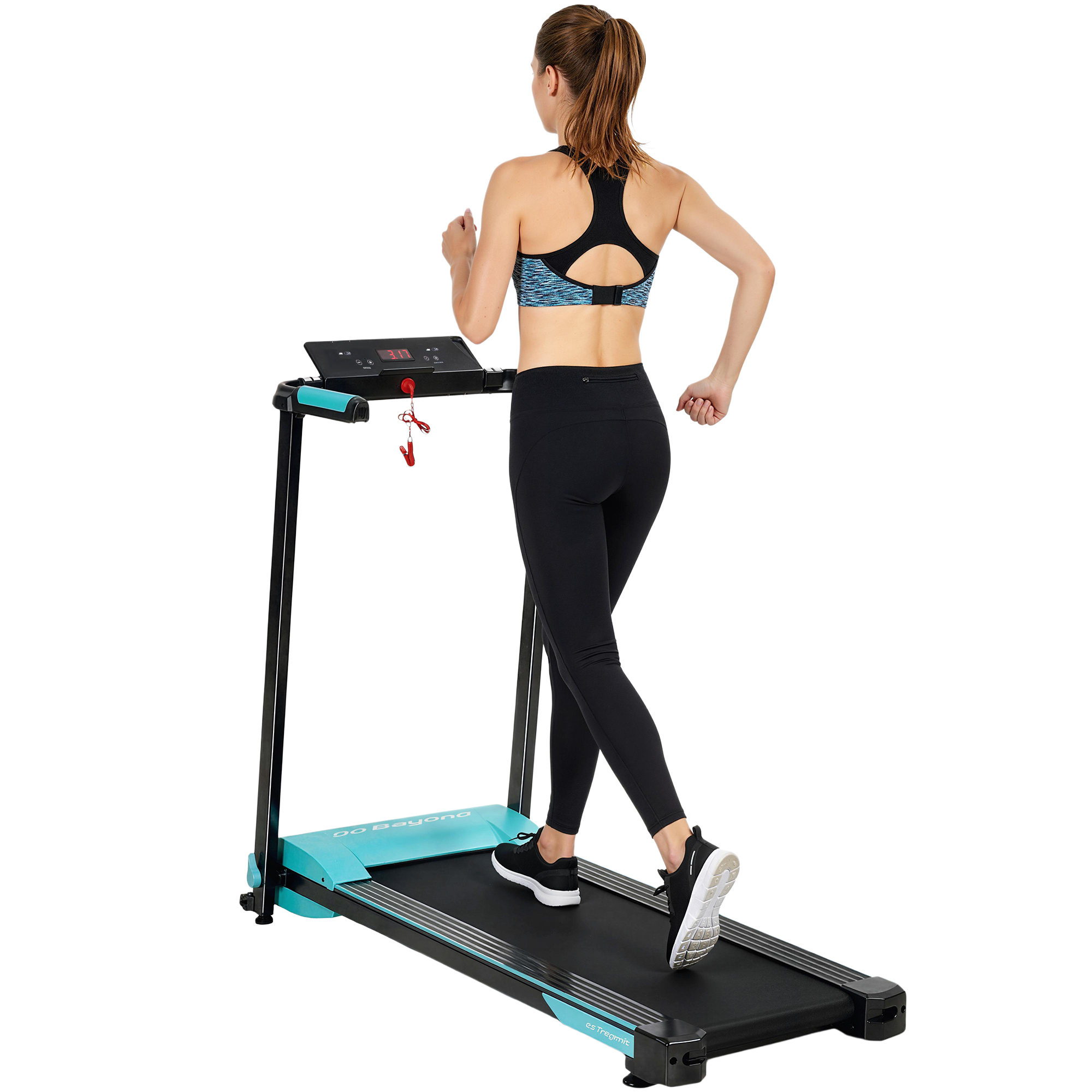 Una donna con la coda di cavallo corre su un tapis roulant turchese.