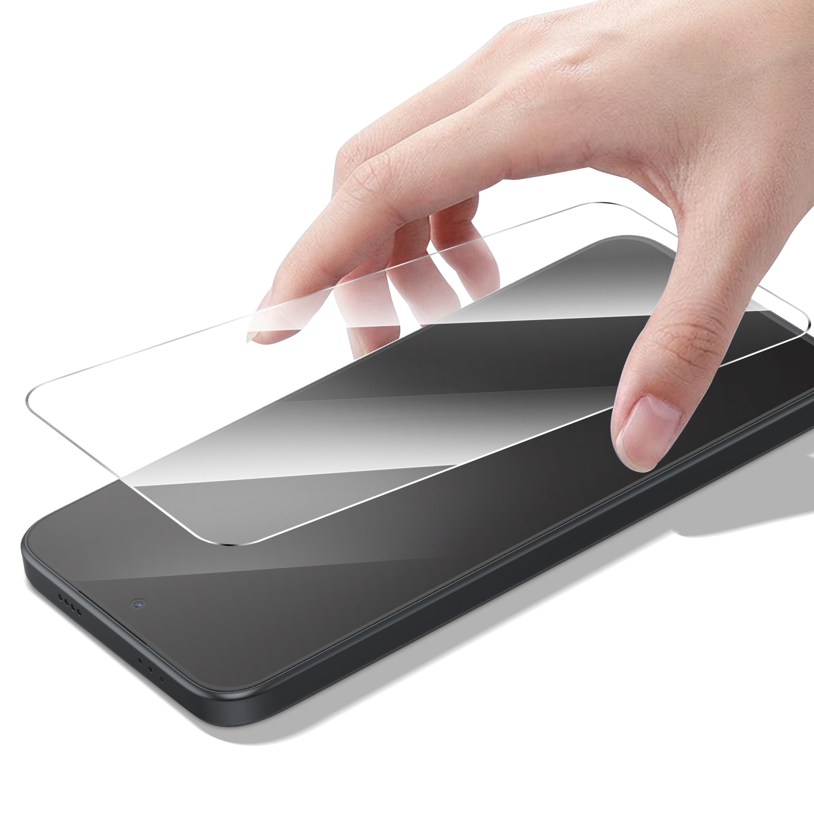 Una mano coloca un protector de pantalla transparente sobre un smartphone oscuro.