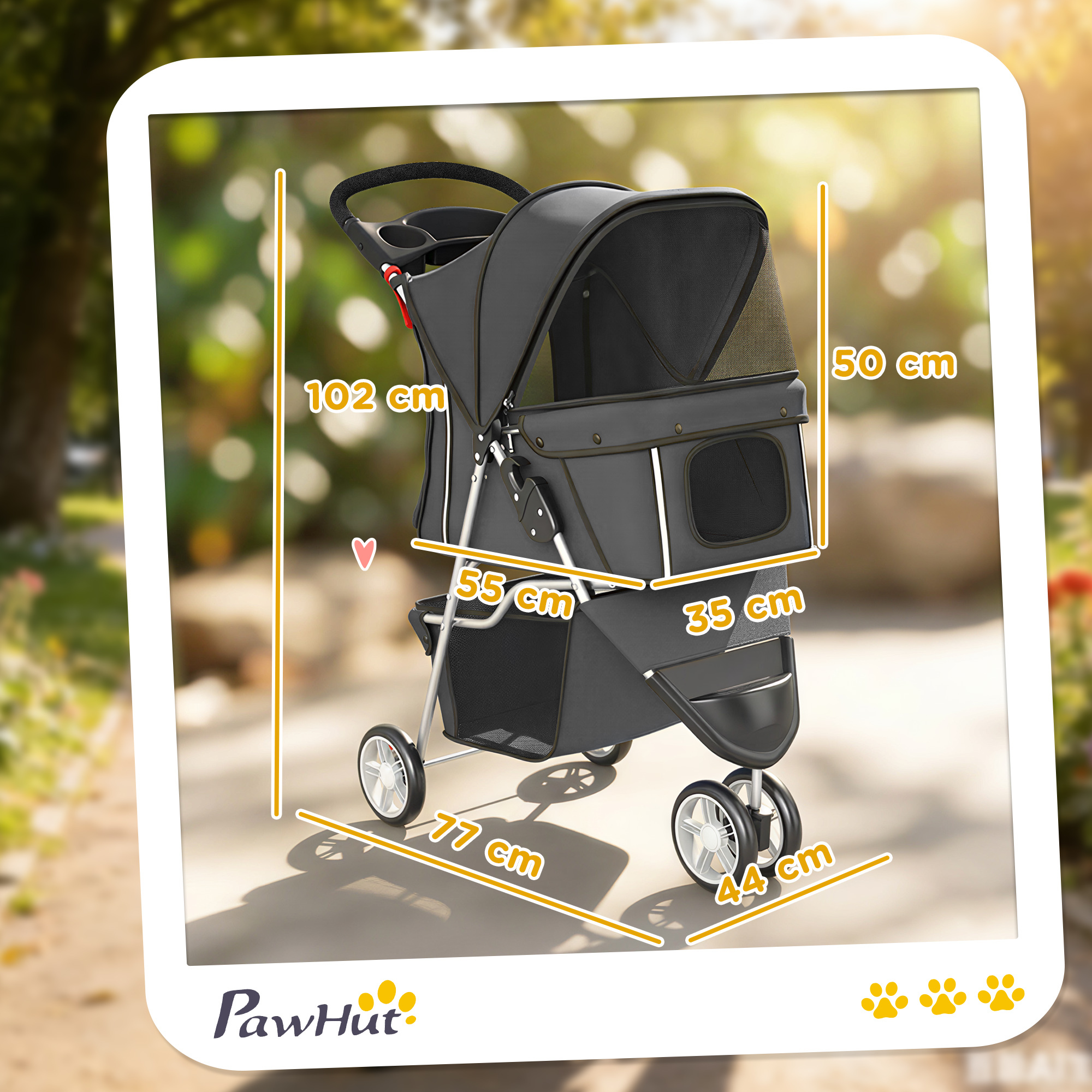 Un passeggino nero per animali domestici con dimensioni, all'aperto su un sentiero.