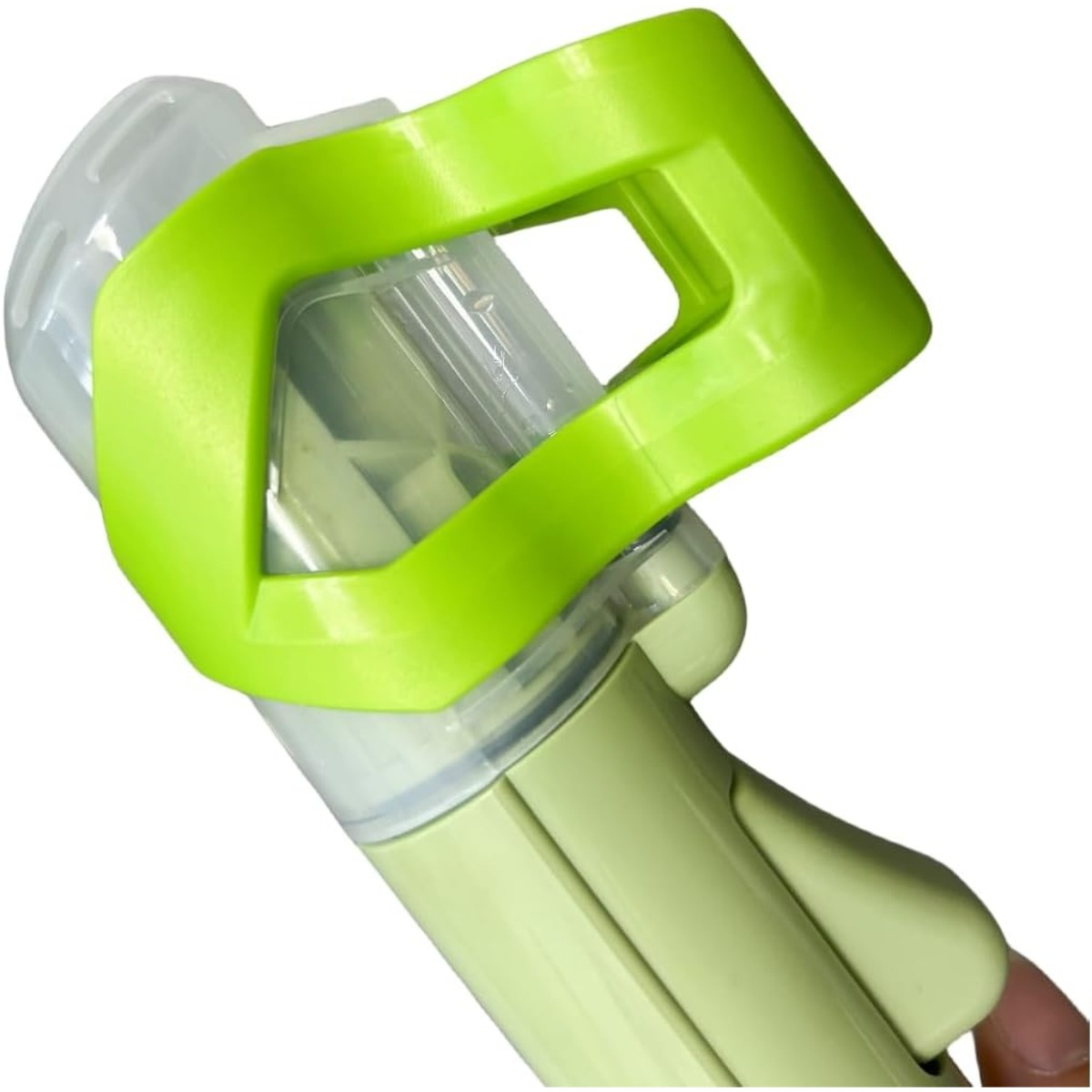 Manico verde e corpo trasparente di un dispositivo di ventilazione.