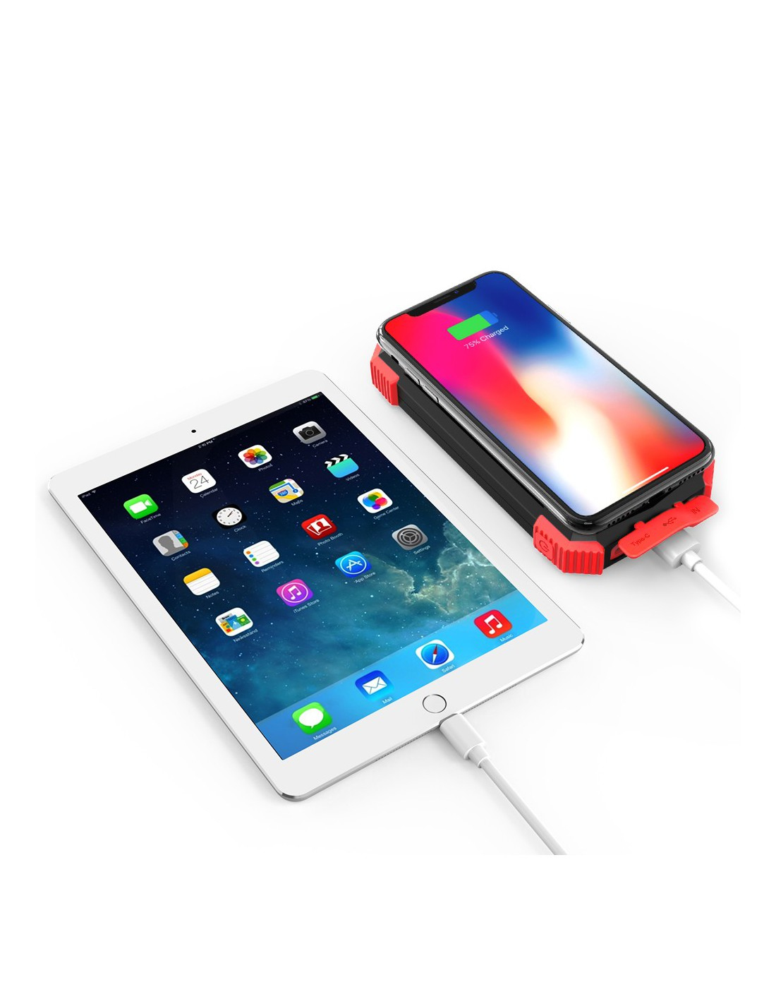 Ein weißes Tablet und ein Smartphone sind an ein schwarzes tragbares Ladegerät angeschlossen.