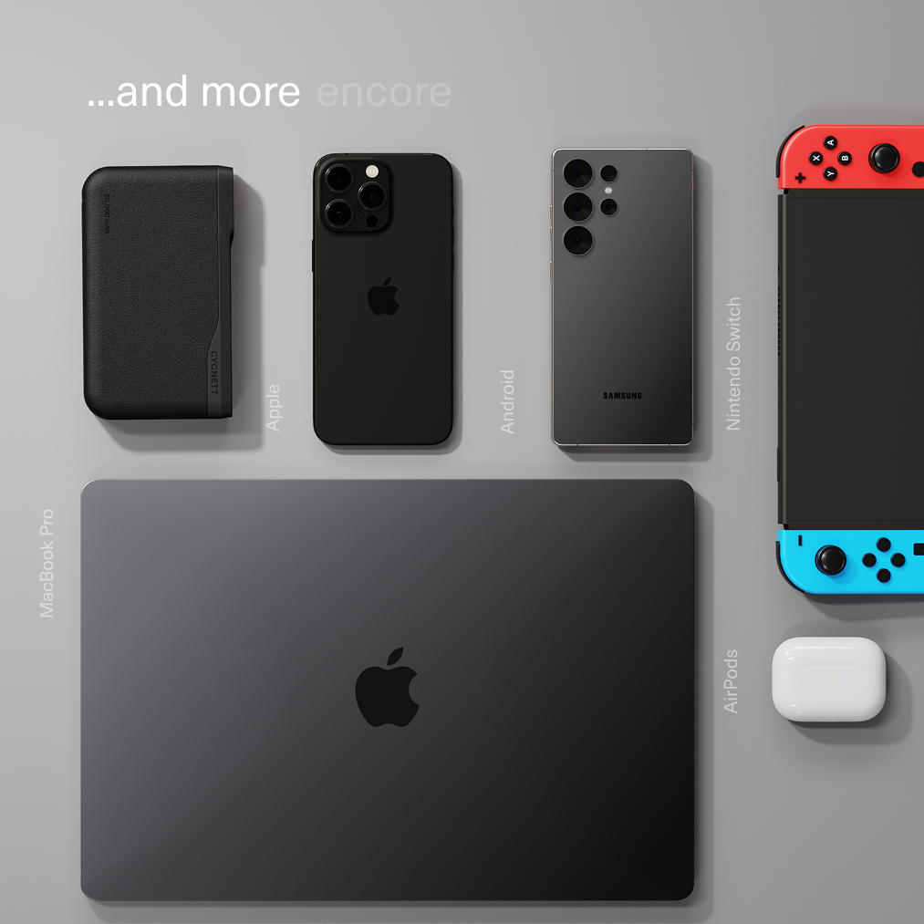 Draufsicht auf dunkle Elektronik: MacBook, Handys, Switch, AirPods-Hülle.