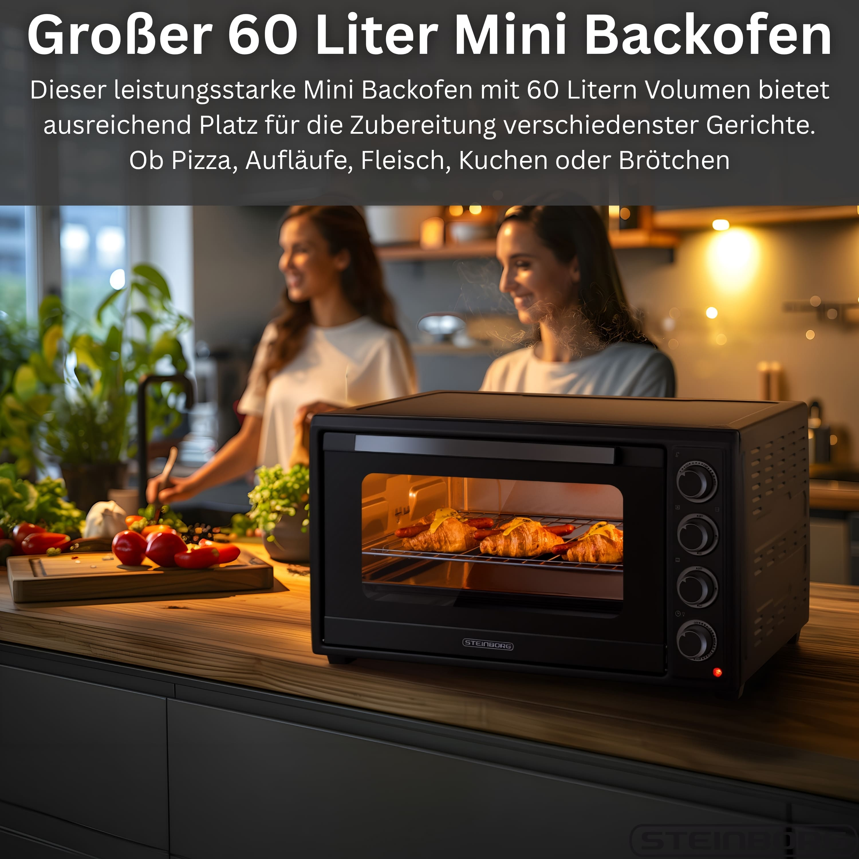 Ein schwarzer Mini-Ofen mit Croissants und Würstchen darin.