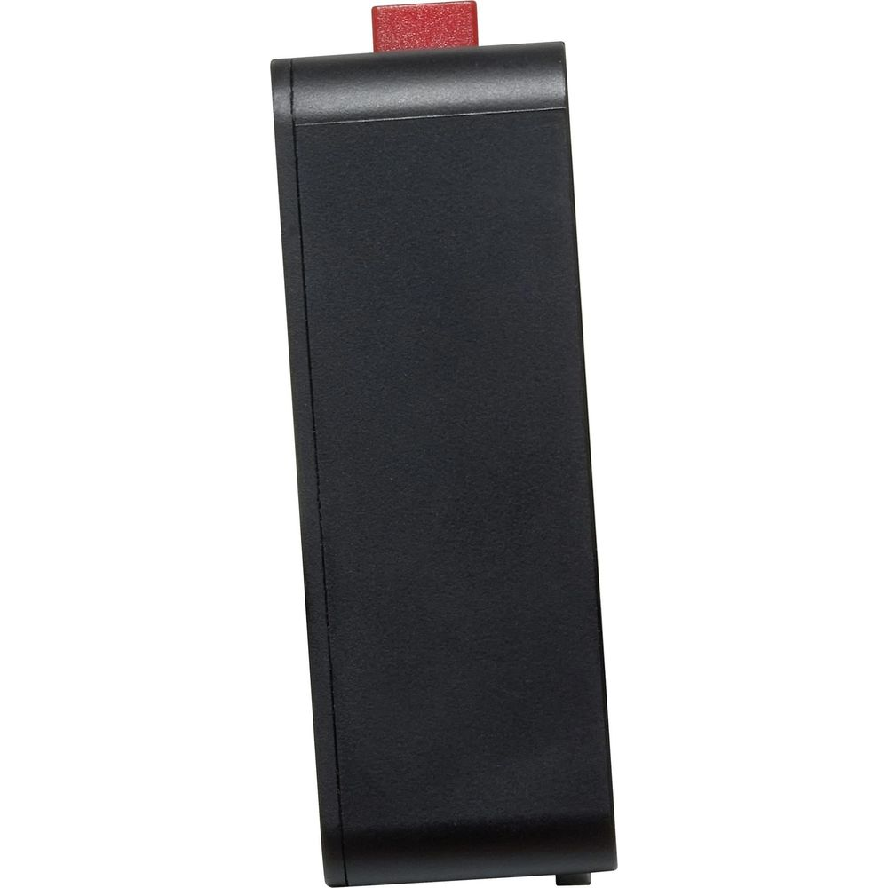 Appareil rectangulaire noir avec un bouton rouge sur le dessus.