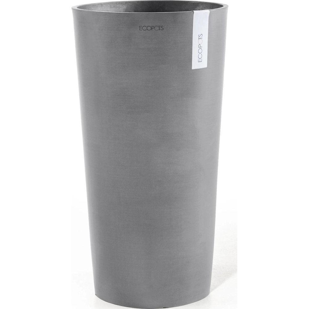 Un pot gris, haut et élancé avec une étiquette blanche et des lettres noires.