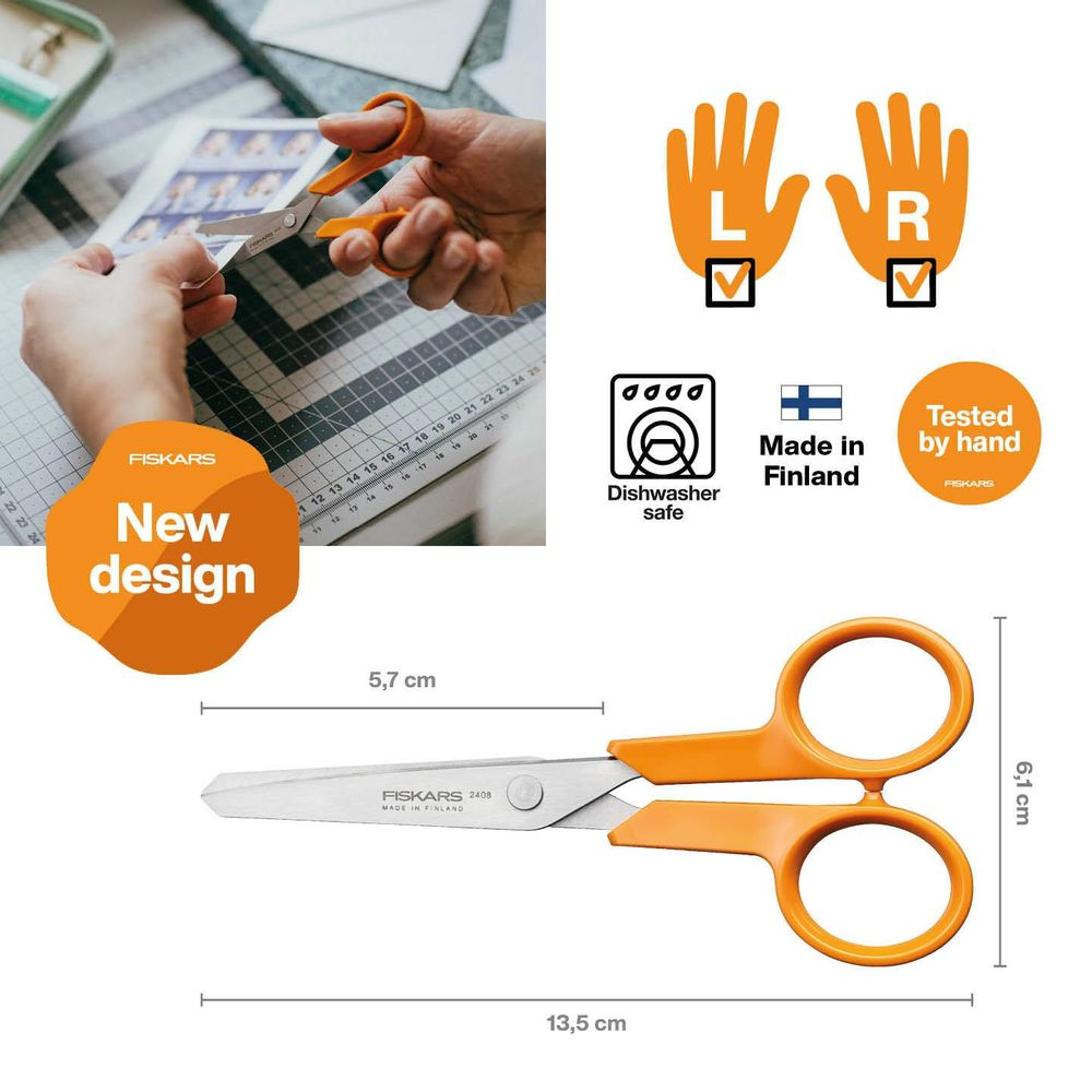 Orange Fiskars-Schere auf einer Schneidematte. Maße angegeben.