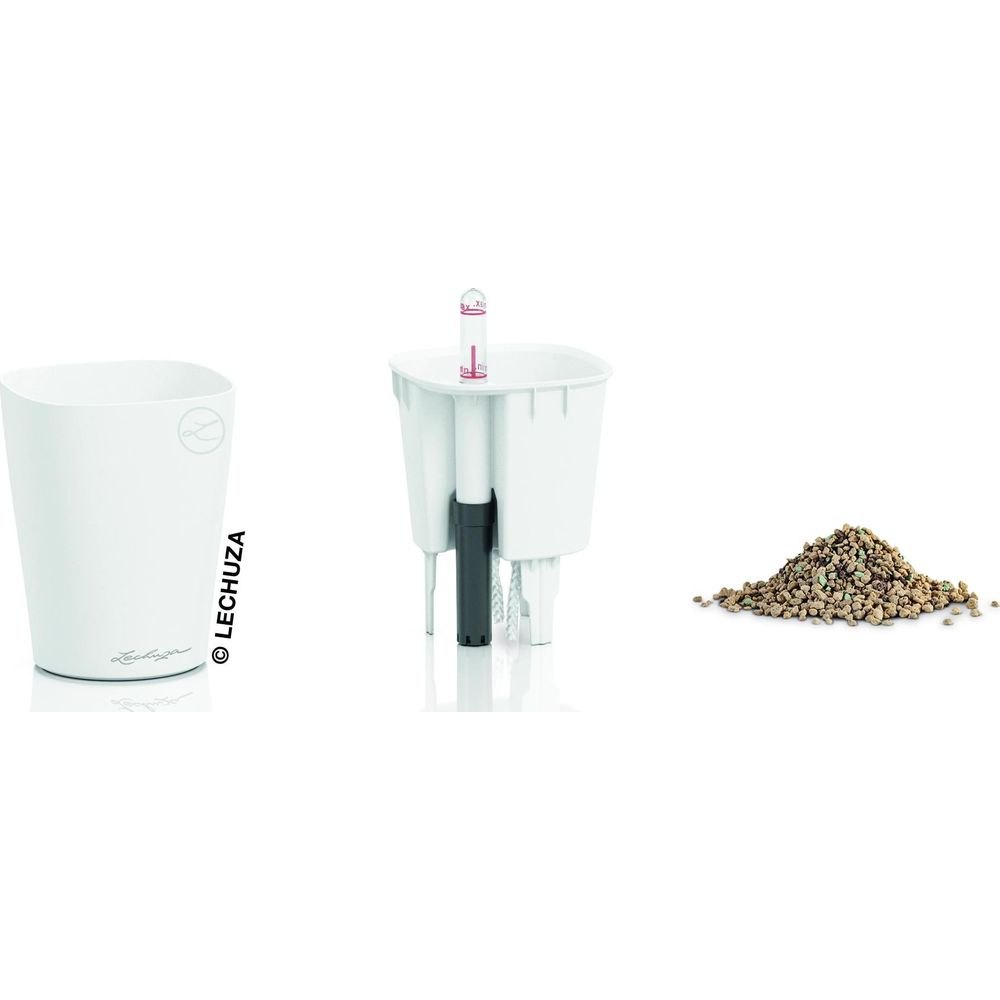 Un pot blanc, un système d'irrigation avec indicateur de niveau d'eau et un tas de granulés.