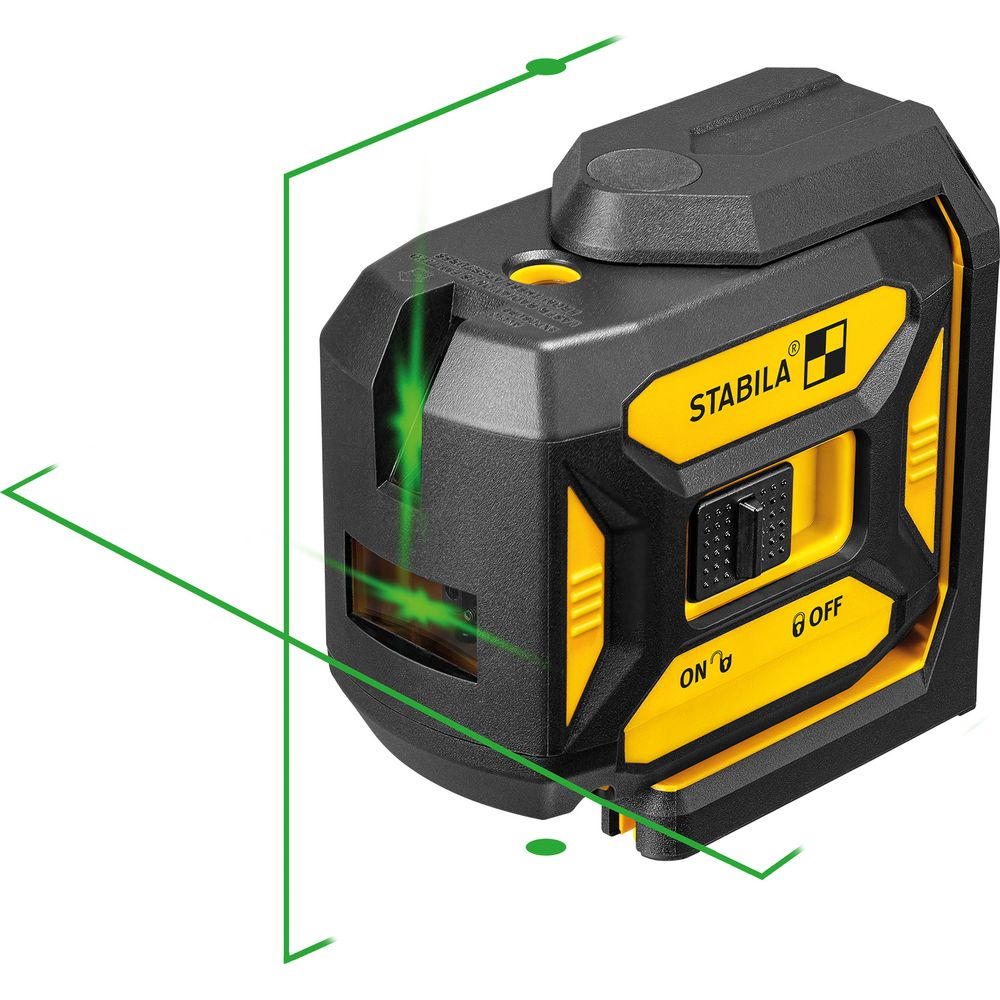 Un niveau laser Stabila noir et jaune projette des lignes laser vertes.