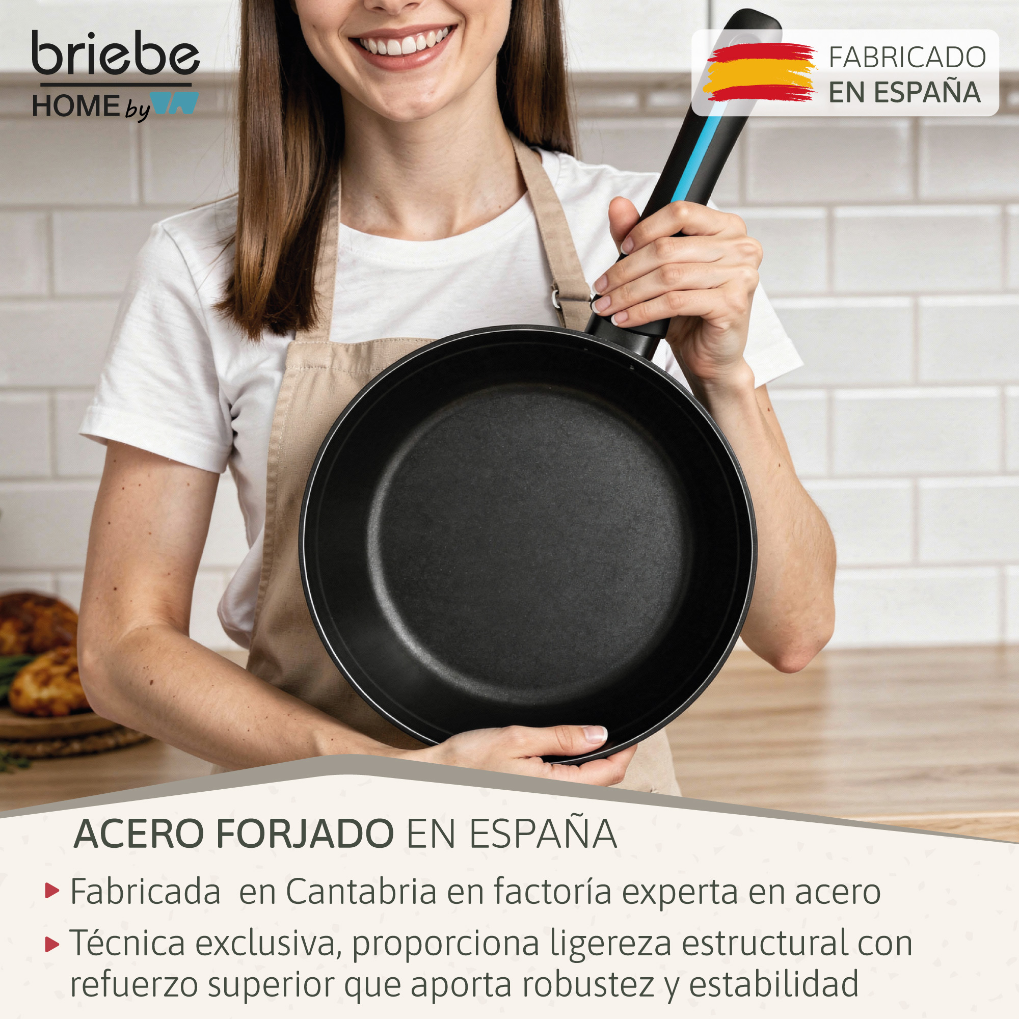 Mujer sujeta sartén negra con mango azul-negro. "Hecho en España".