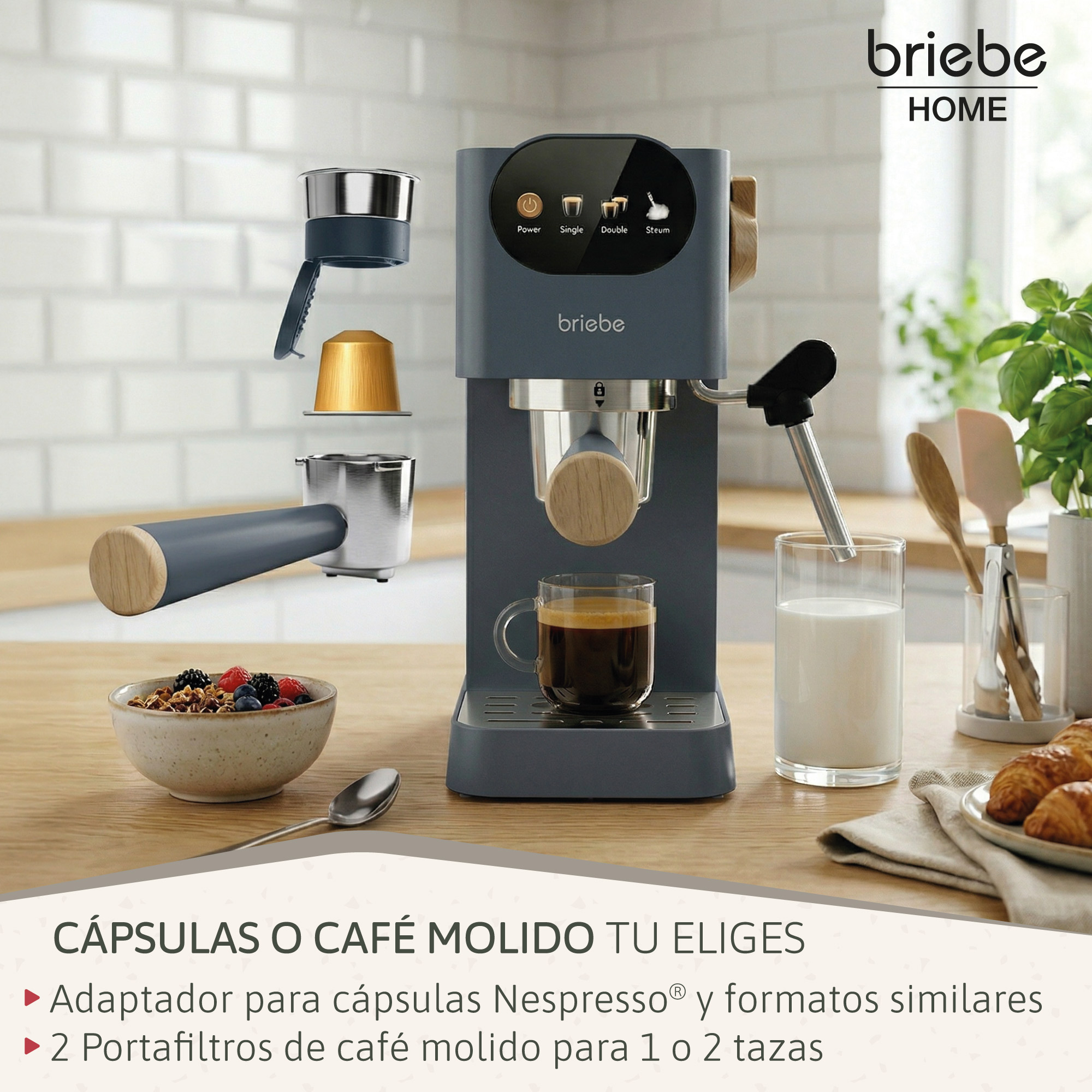 Eine graue Espressomaschine mit einem Glas Kaffee, Milch und Gebäck.